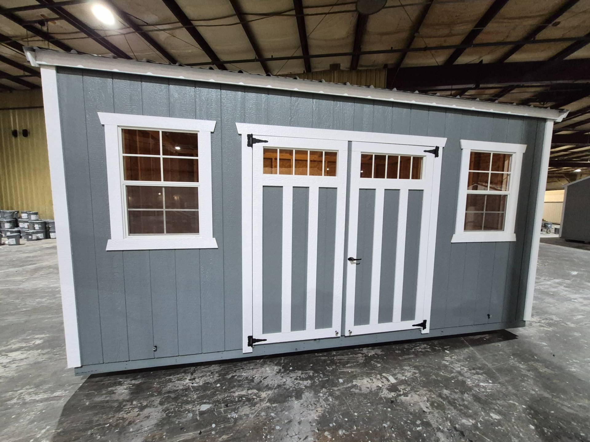 Standard Utility 10x16 portable building in Rough Ride