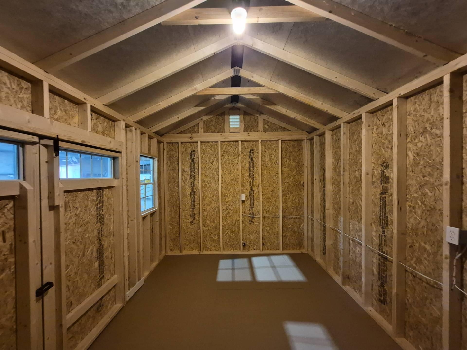 Standard Utility 10x16 portable building in Rough Ride