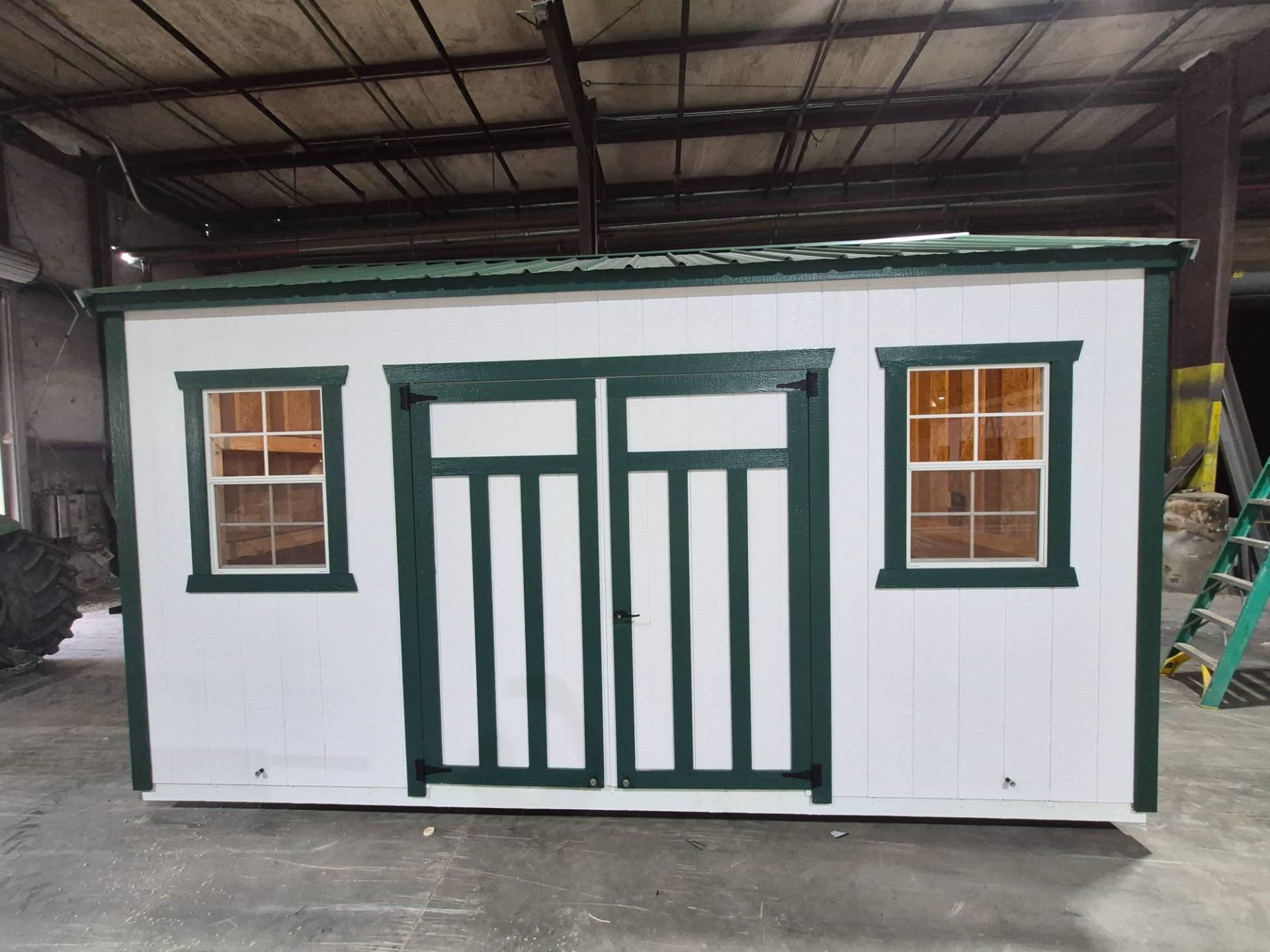 Standard Utility 10x16 portable building in Navajo White