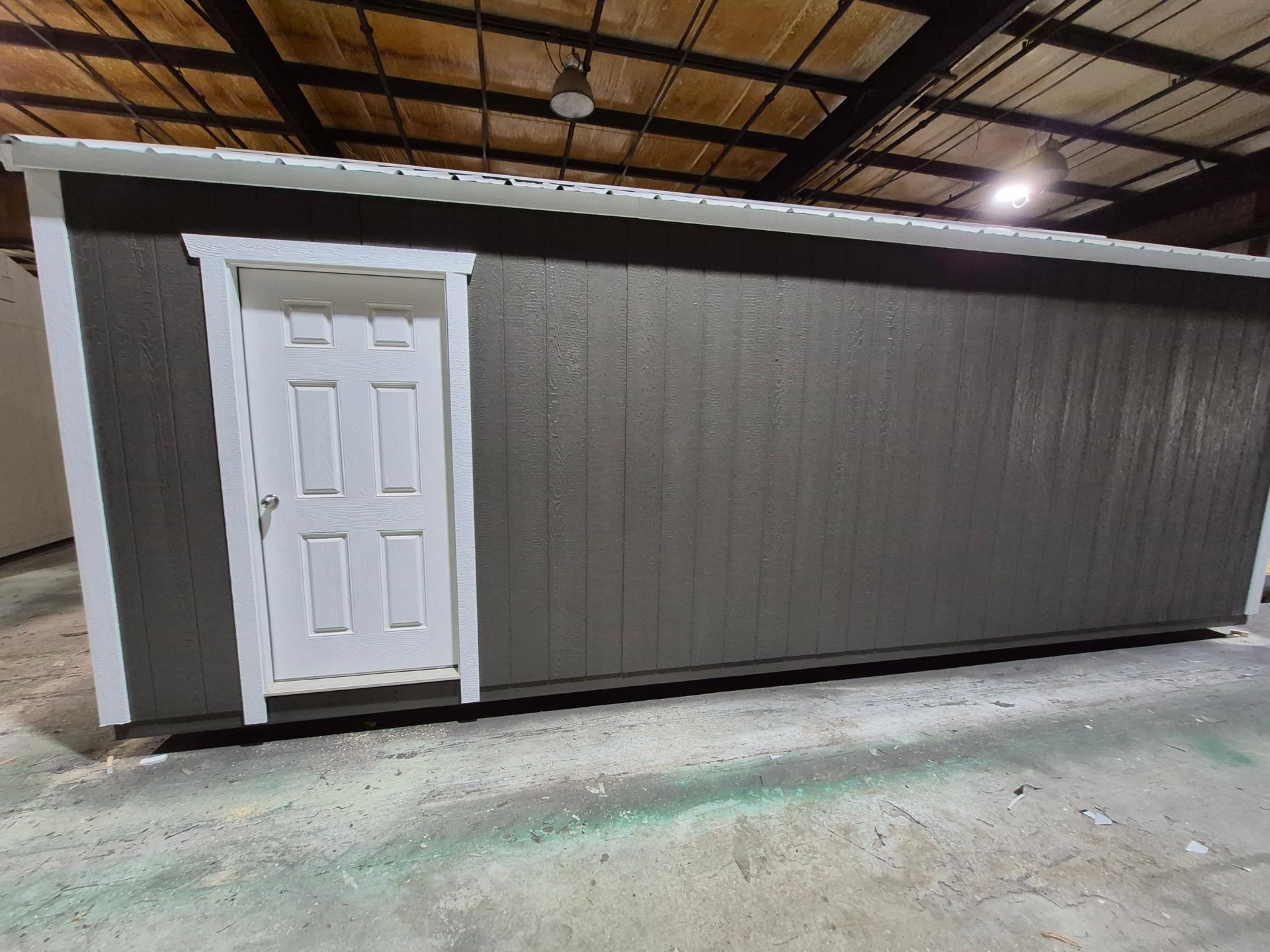 Standard Utility 10x24 portable building in Dark Woods