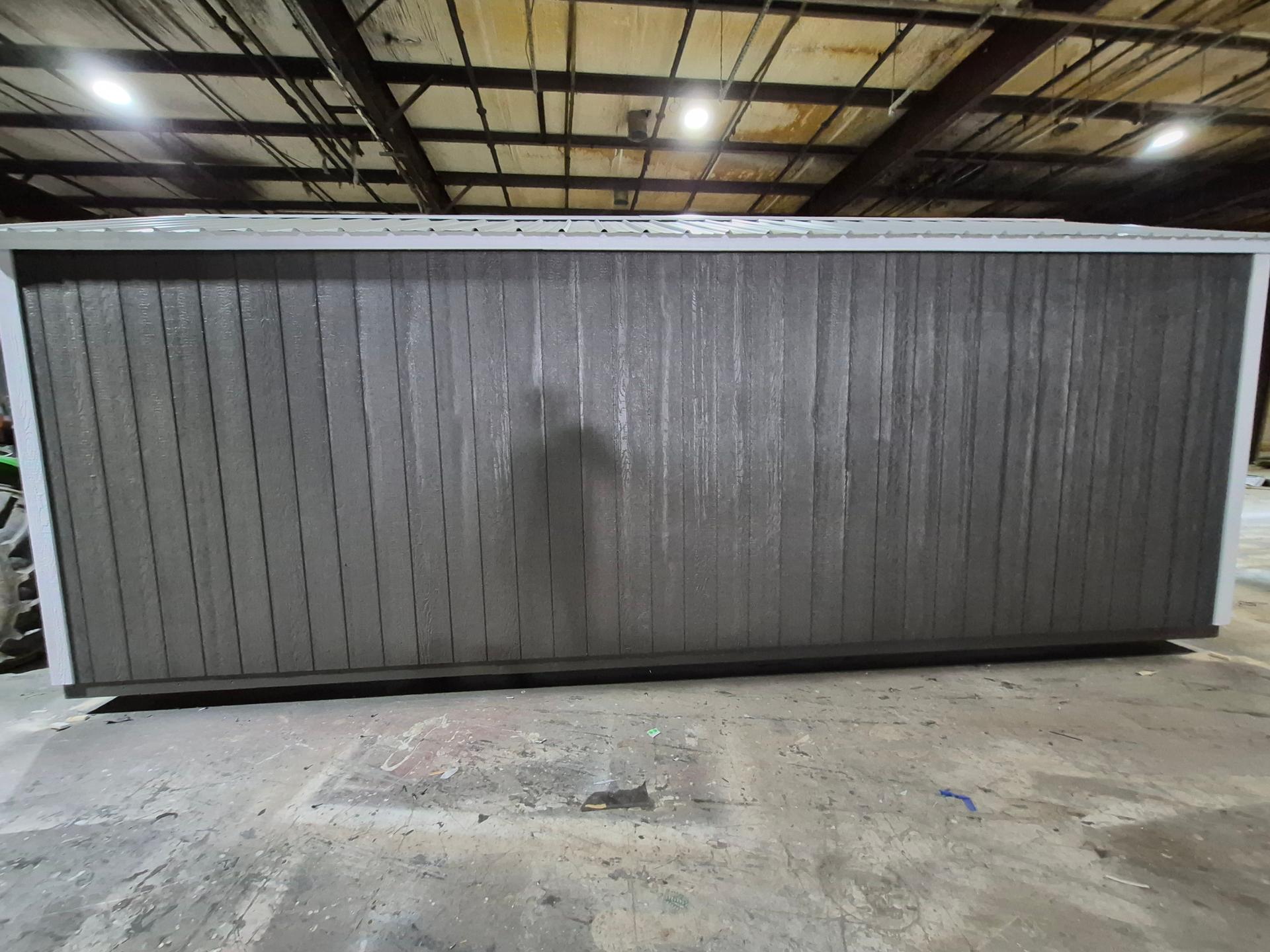 Standard Utility 10x24 portable building in Dark Woods