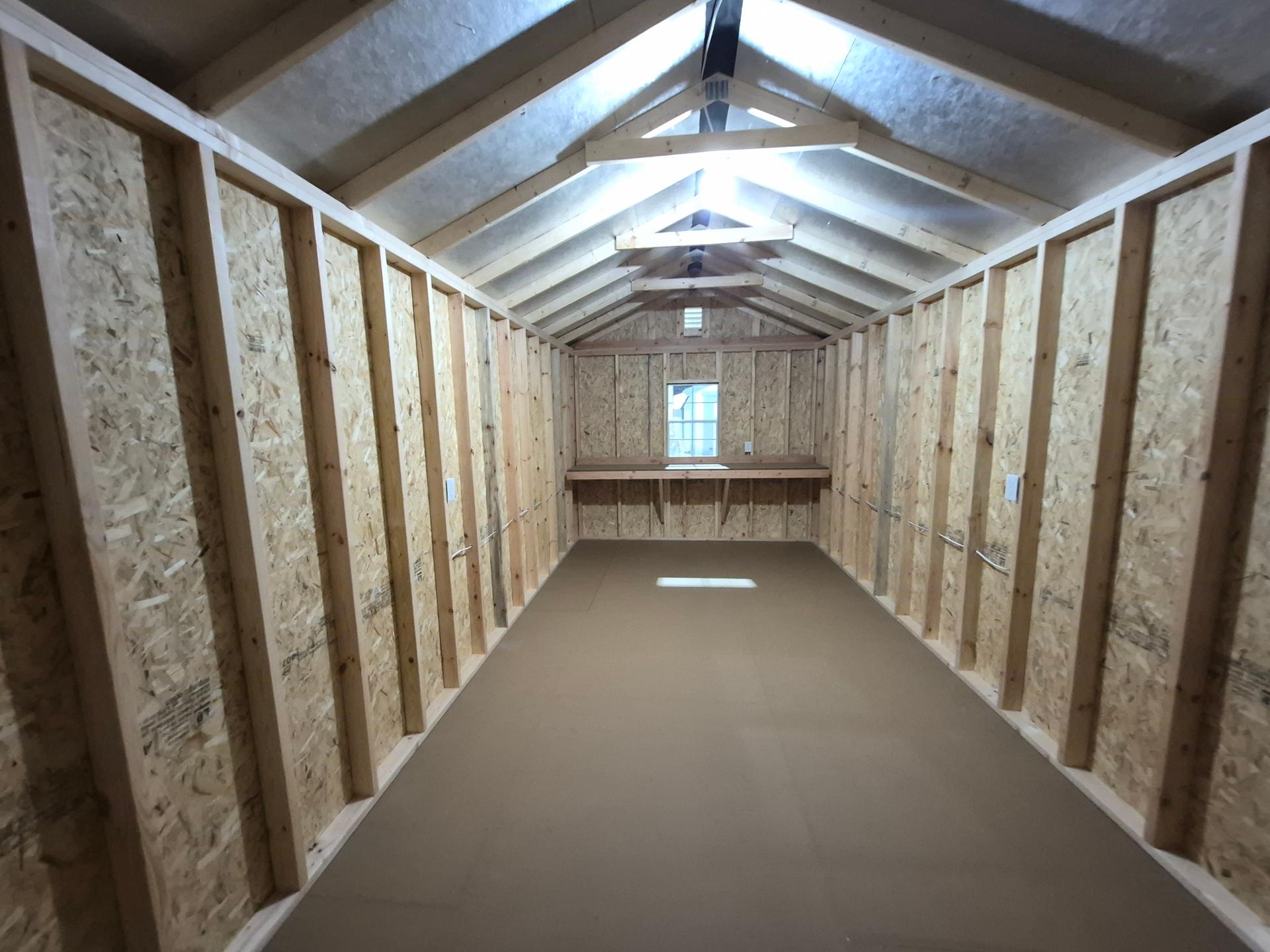 Standard Utility 10x24 portable building in Dark Woods