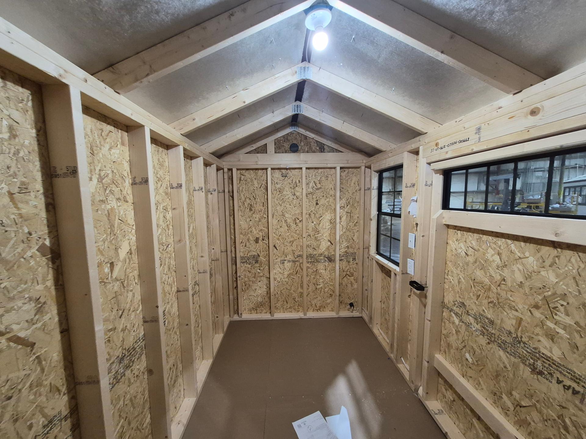 Standard Utility 6x12 portable building in White