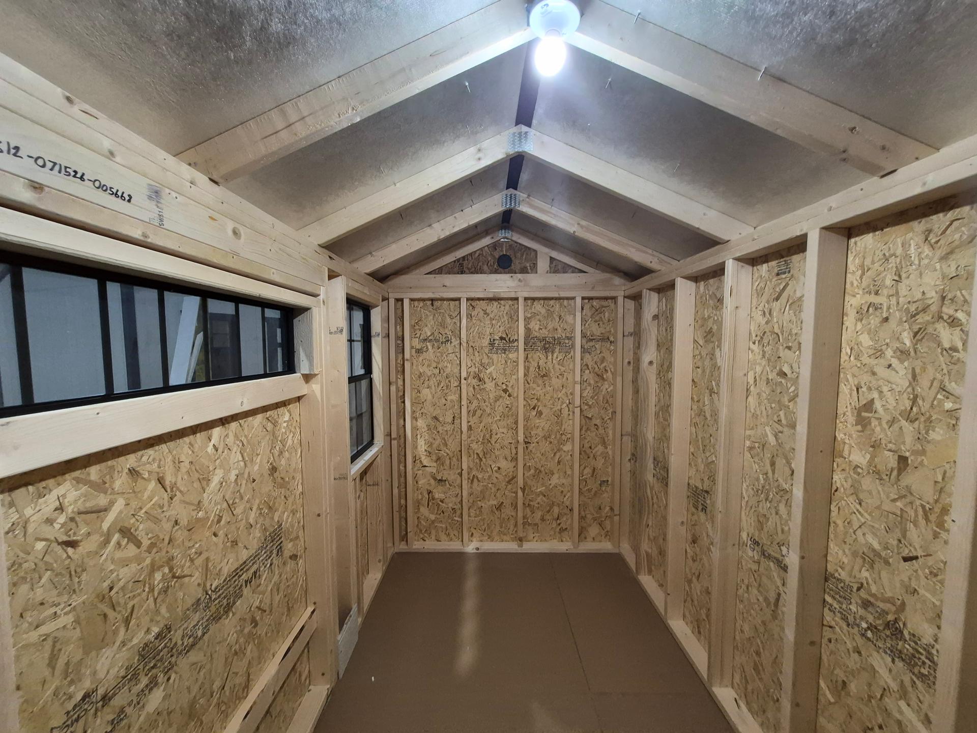 Standard Utility 6x12 portable building in White