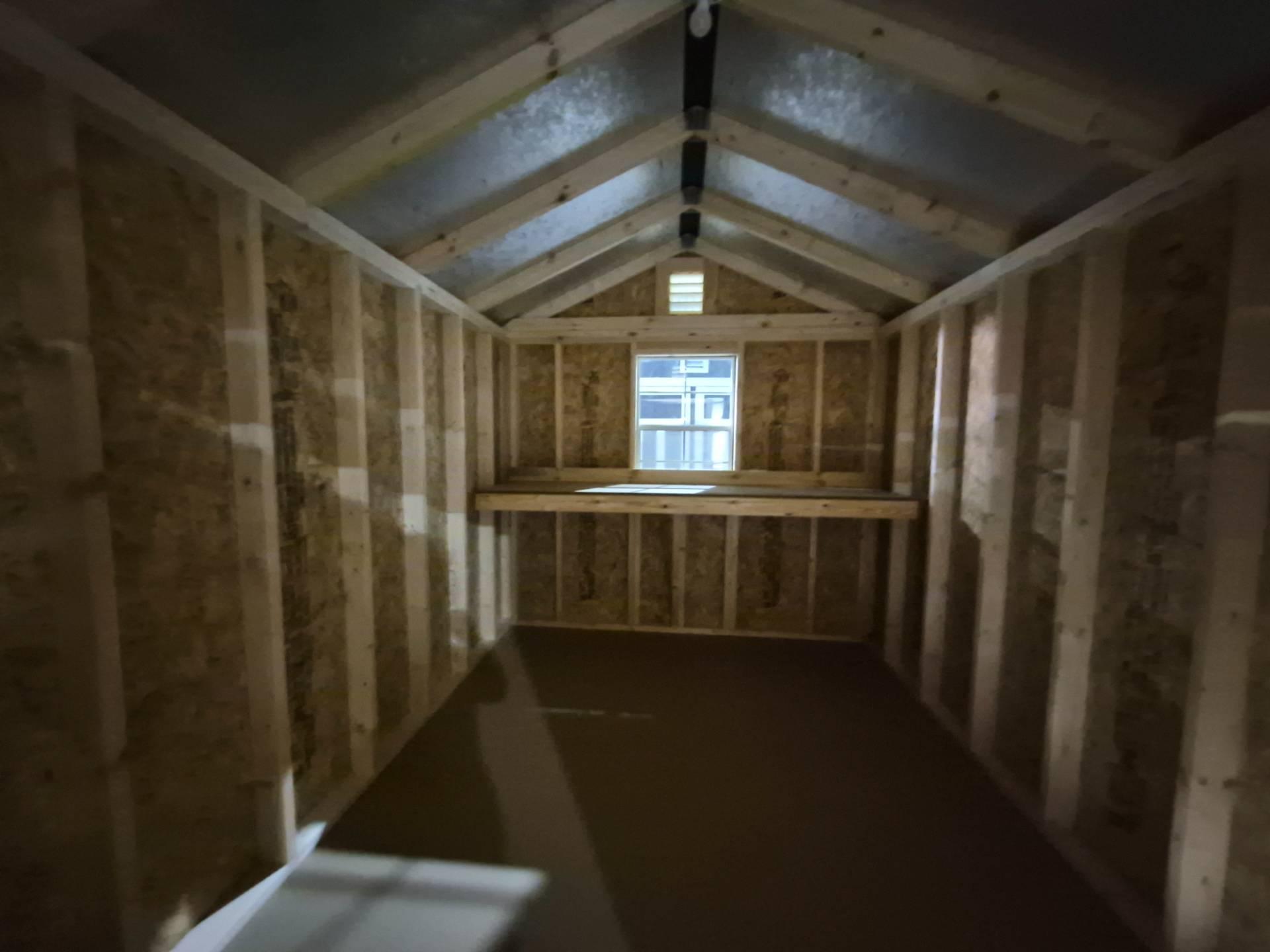 Standard Utility 8x12 portable building in Rough Ride