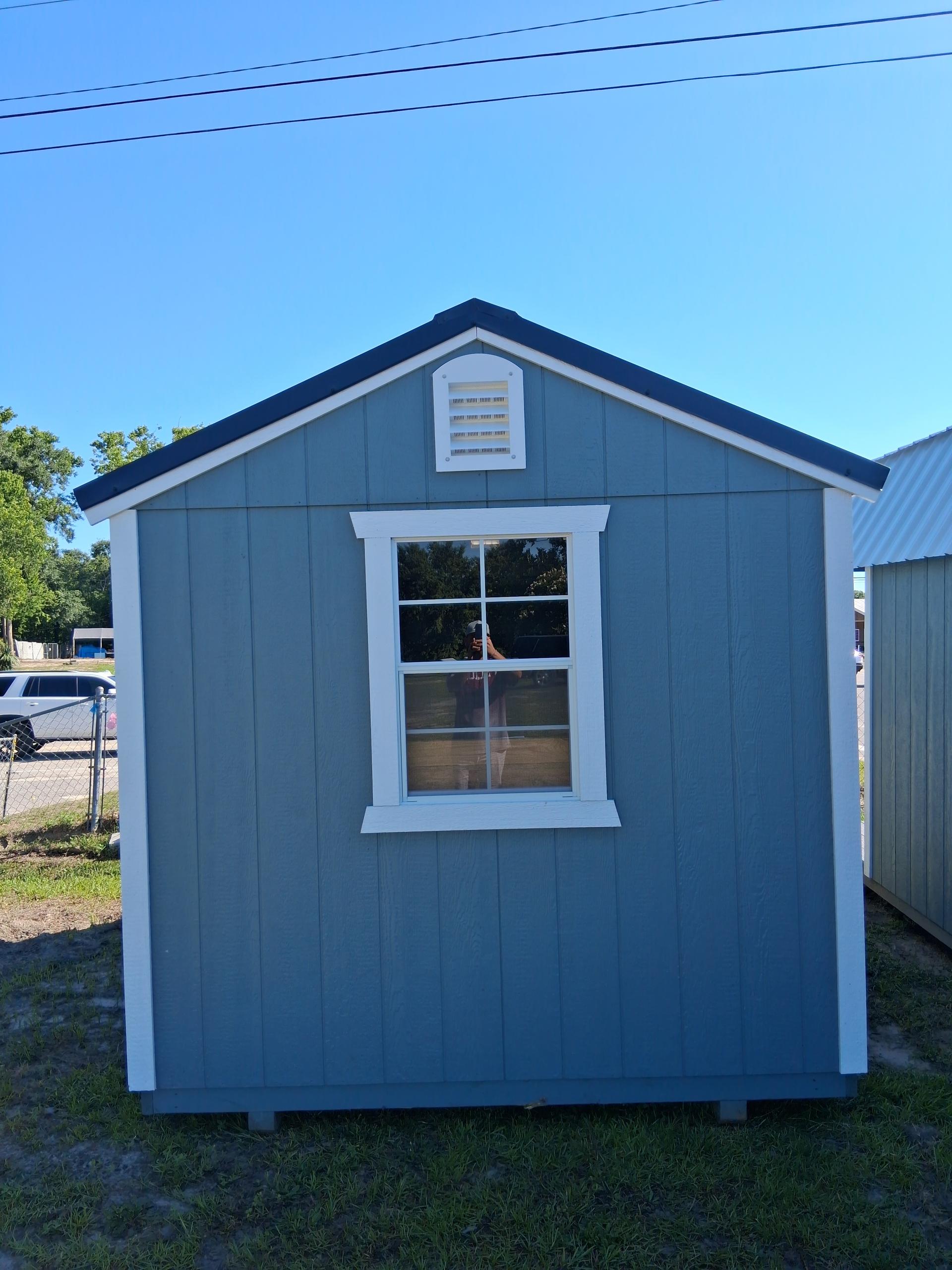 Standard Utility 8x12 portable building in Rough Ride