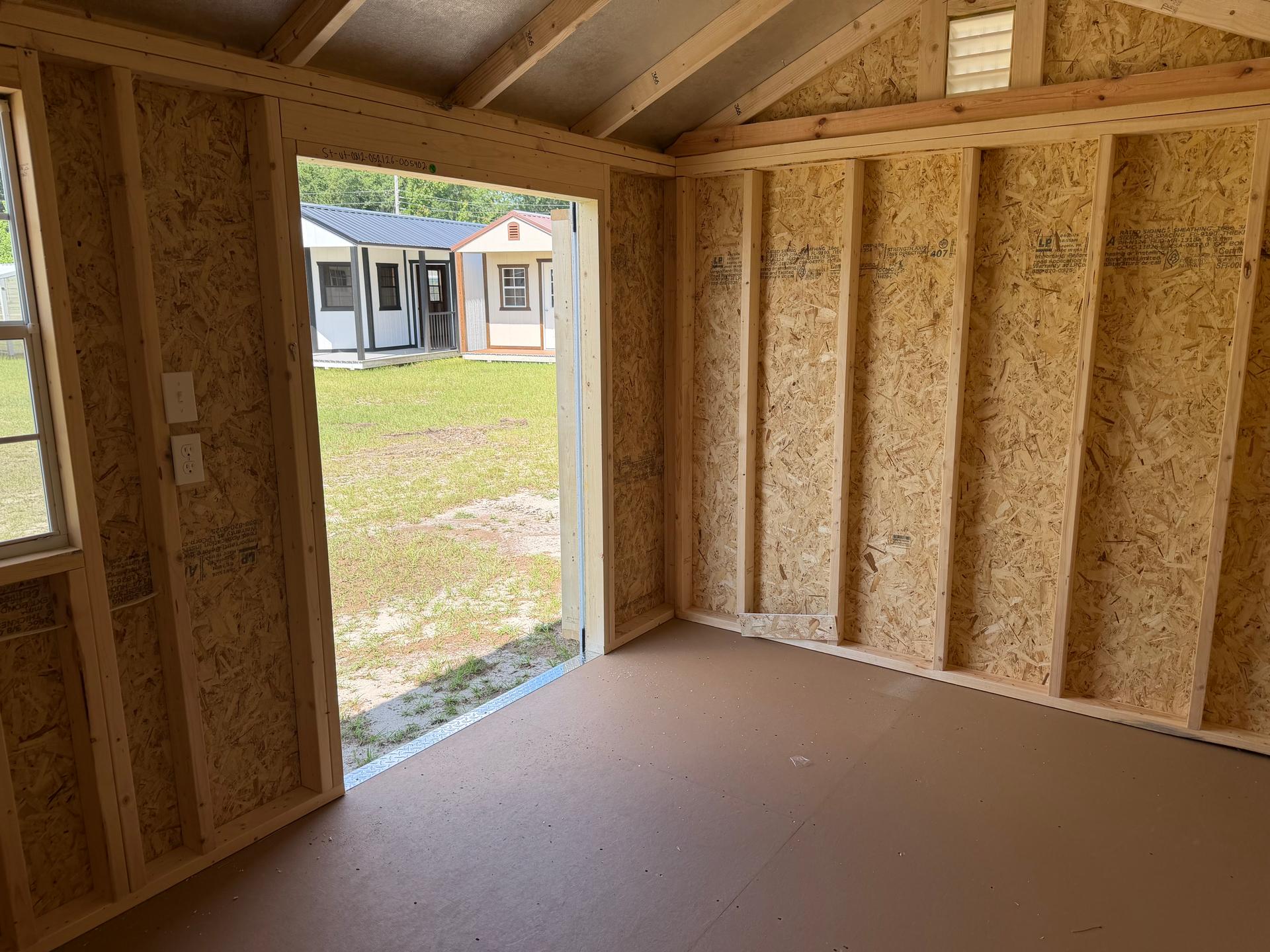 Standard Utility 8x12 portable building in Pale Pine