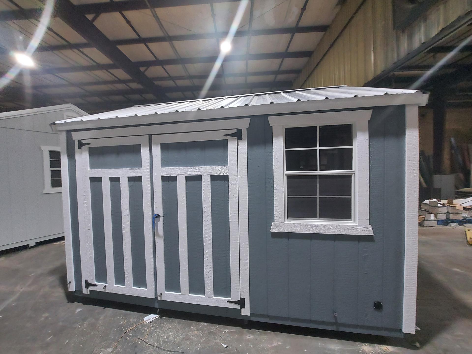 Standard Utility 10x12 portable building in Phoenix Grey