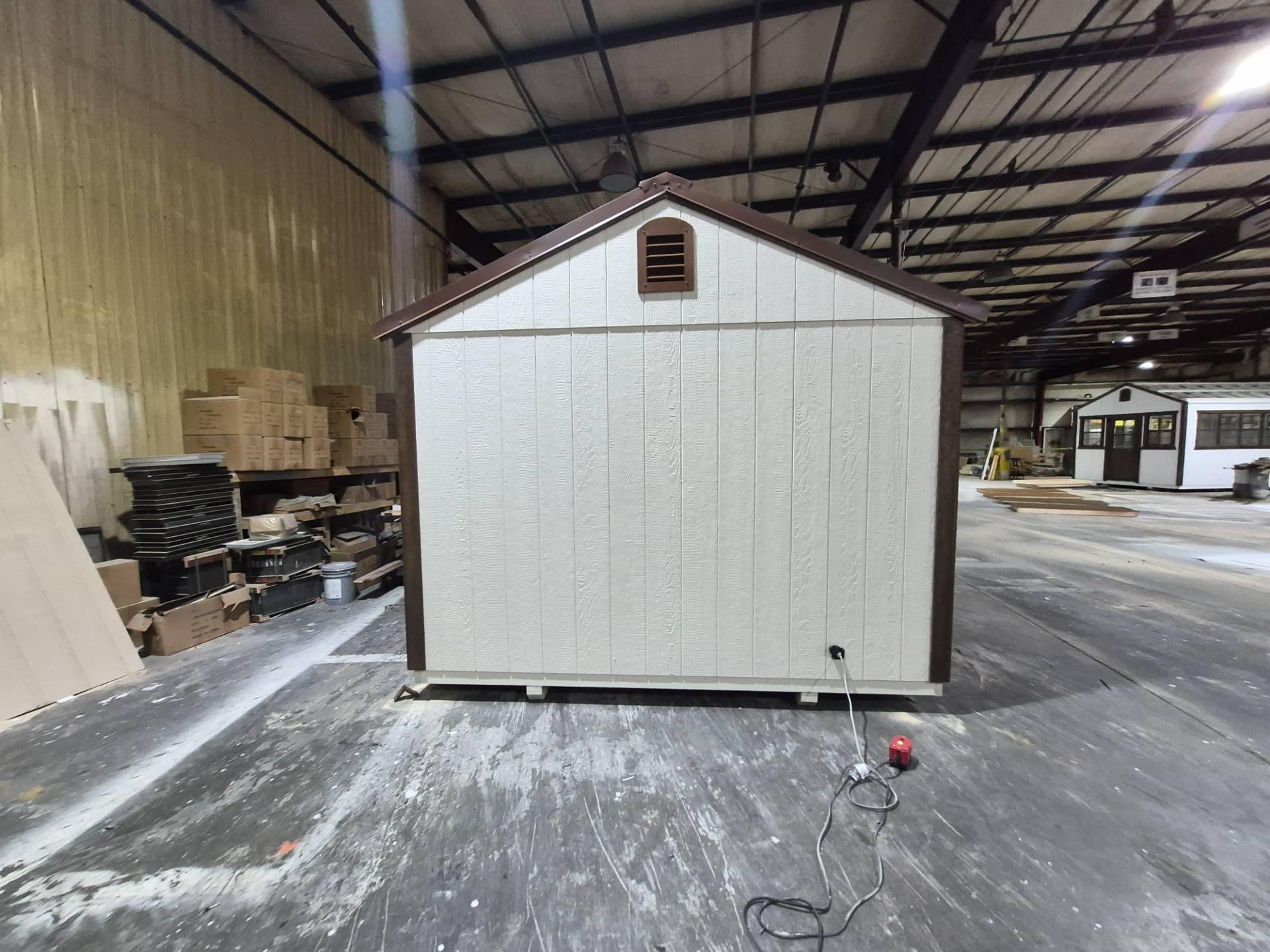 Standard Utility 10x12 portable building in Navajo White