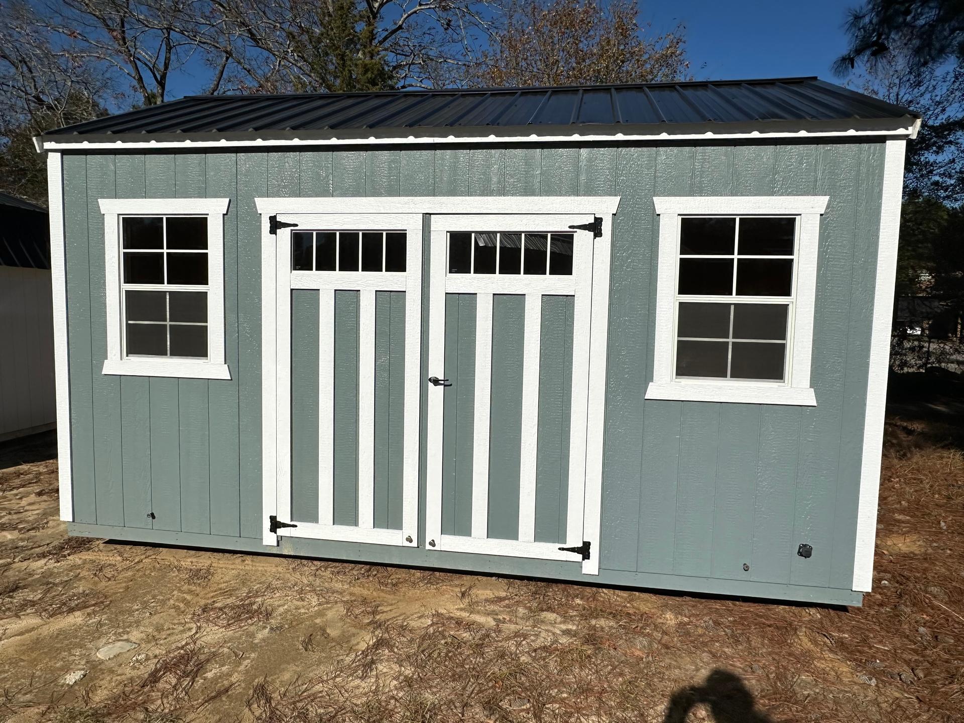 Standard Utility 10x16 portable building in Rough Ride