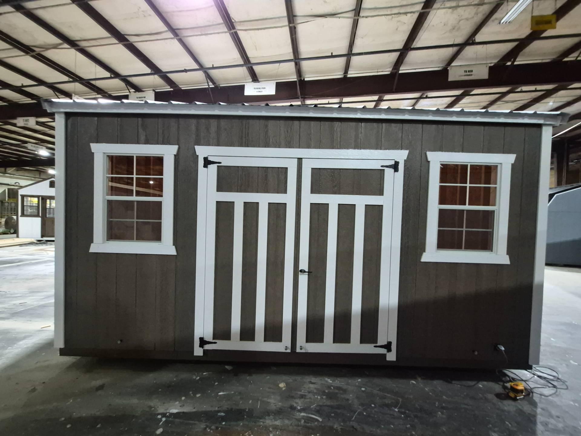Standard Utility 10x16 portable building in Barnwood Gray