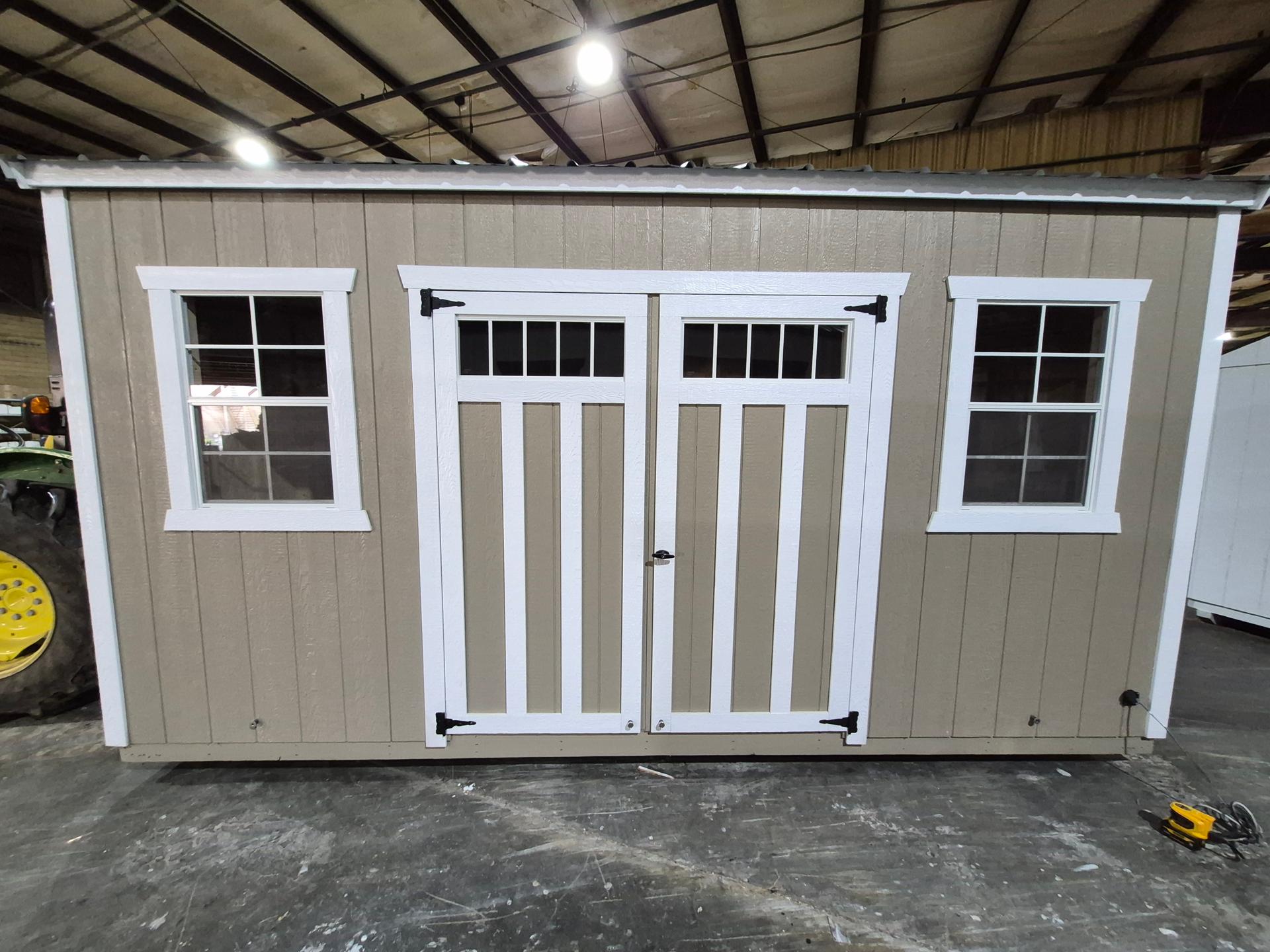 Standard Utility 10x16 portable building in Tanglewood