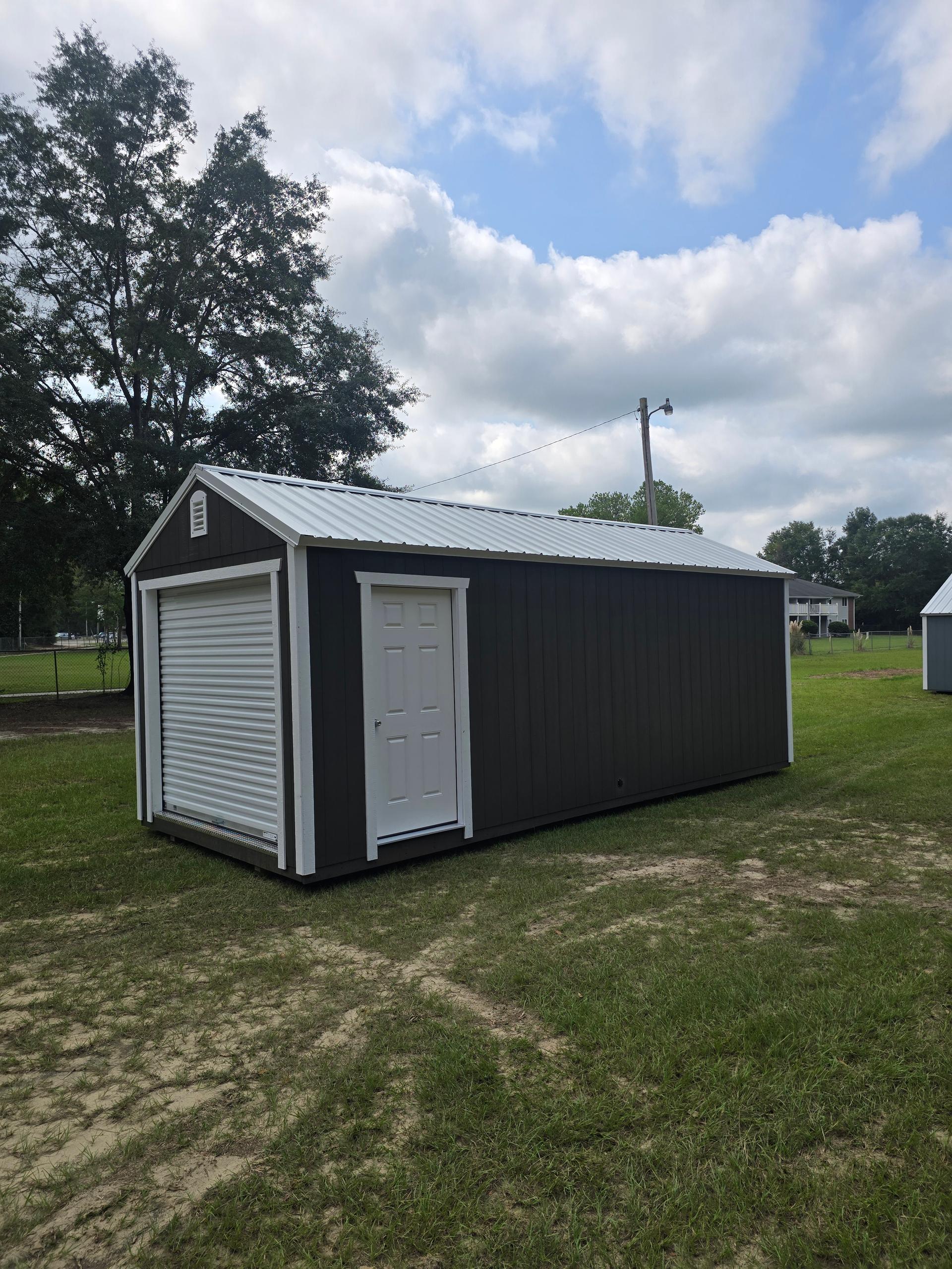 Standard Utility 10x24 portable building in Dark Woods