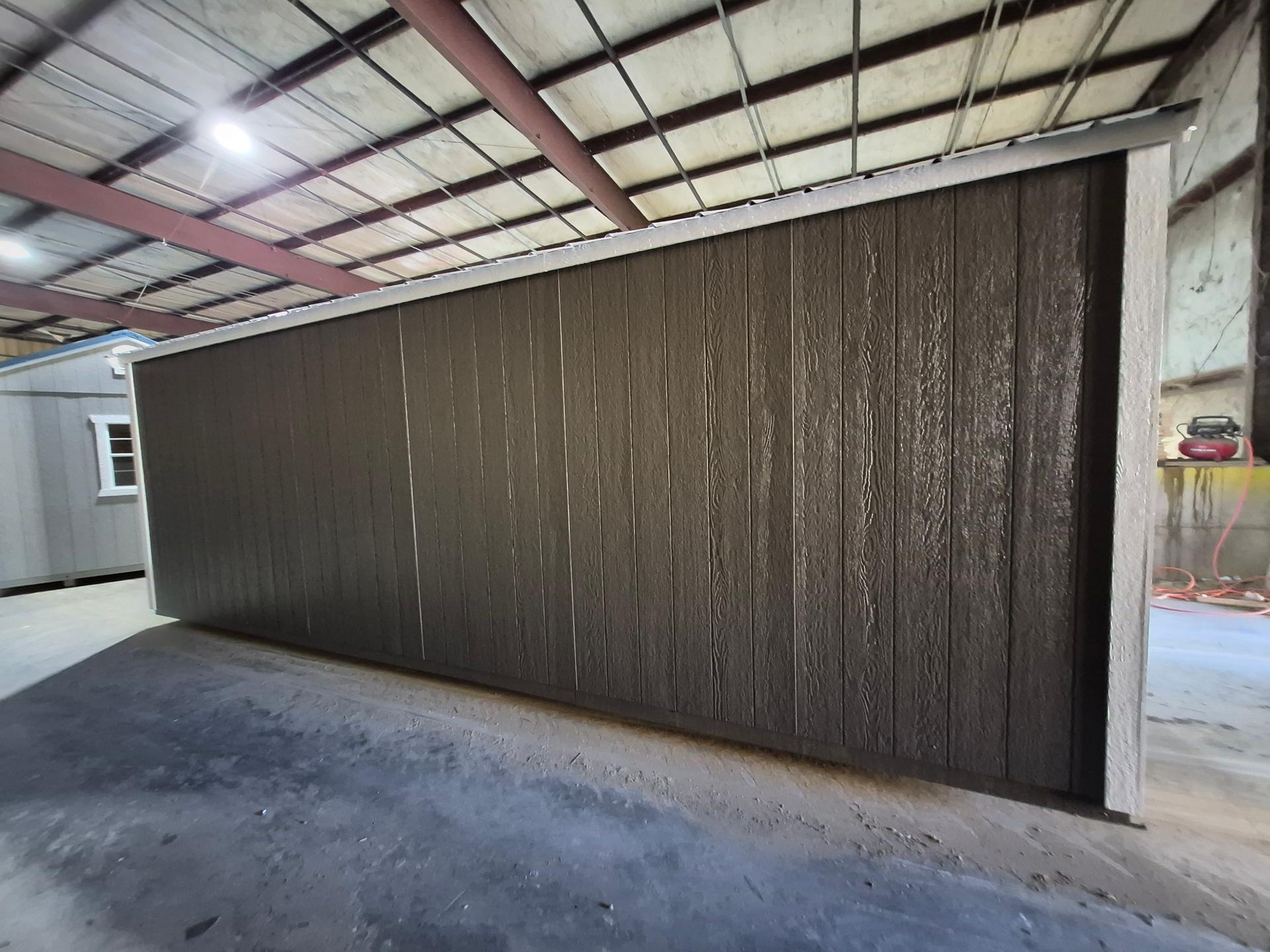 Standard Utility 10x24 portable building in Dark Woods