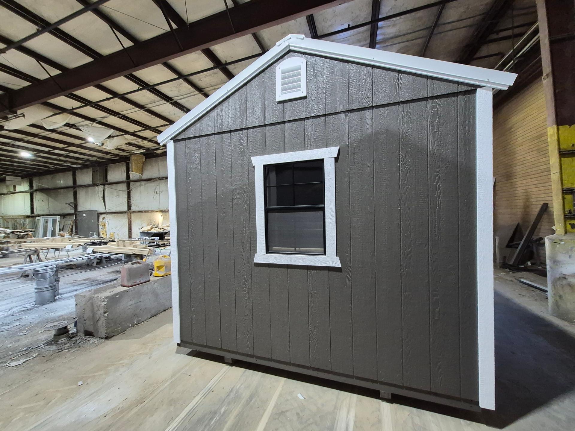 Standard Utility 10x24 portable building in Dark Woods