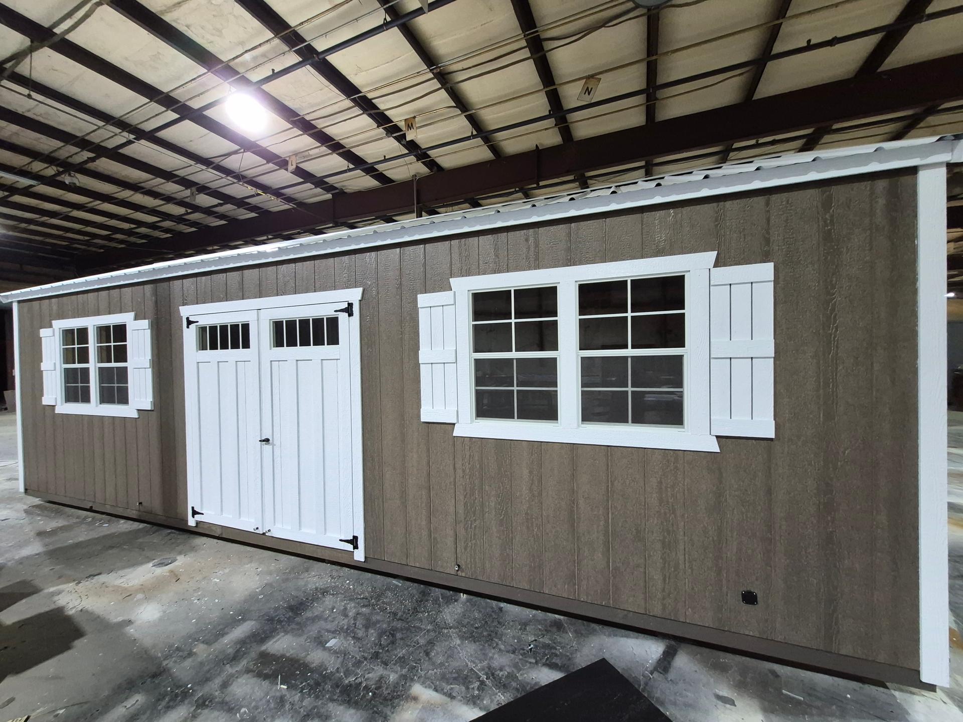 Standard Utility 12x28 portable building in Barnwood Gray