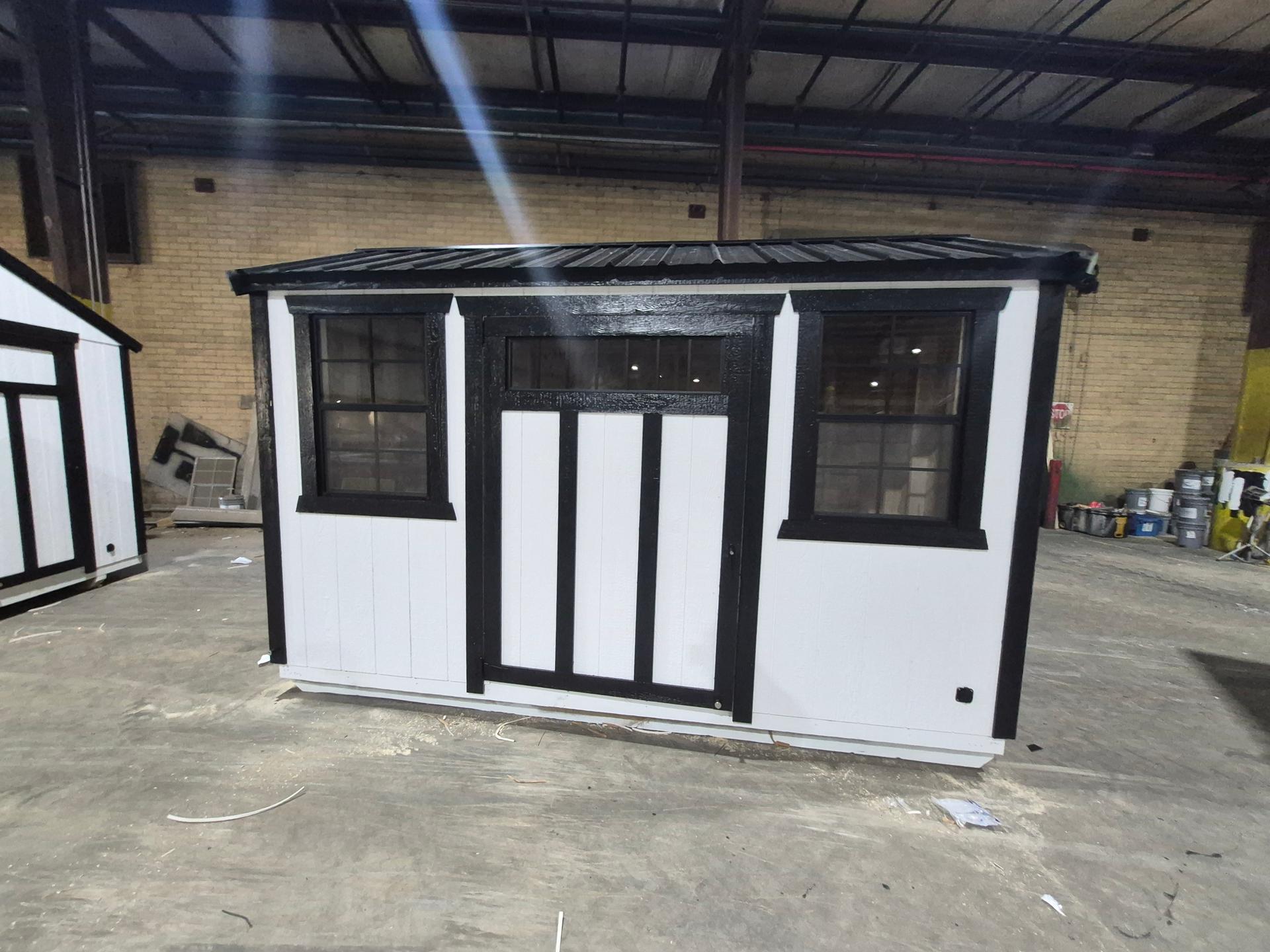 Standard Utility 6x12 portable building in White