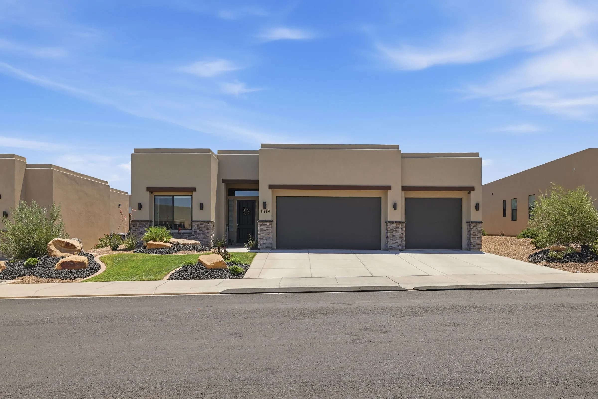 Single-story stucco home with a two-car garage