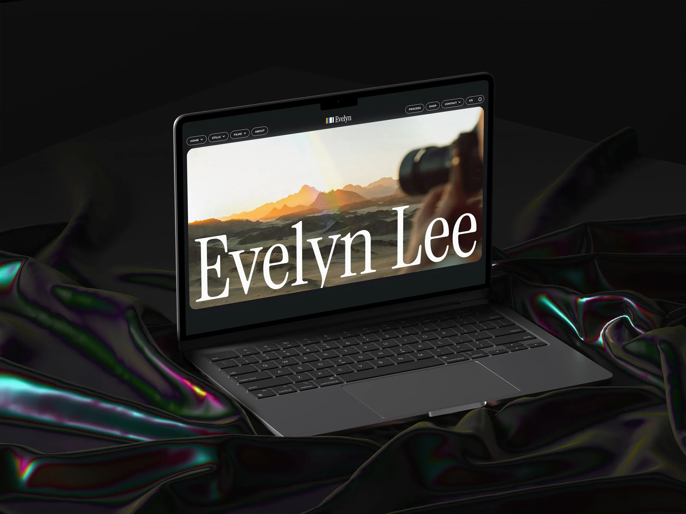 A laptop with the word evelyn lee on the screen.