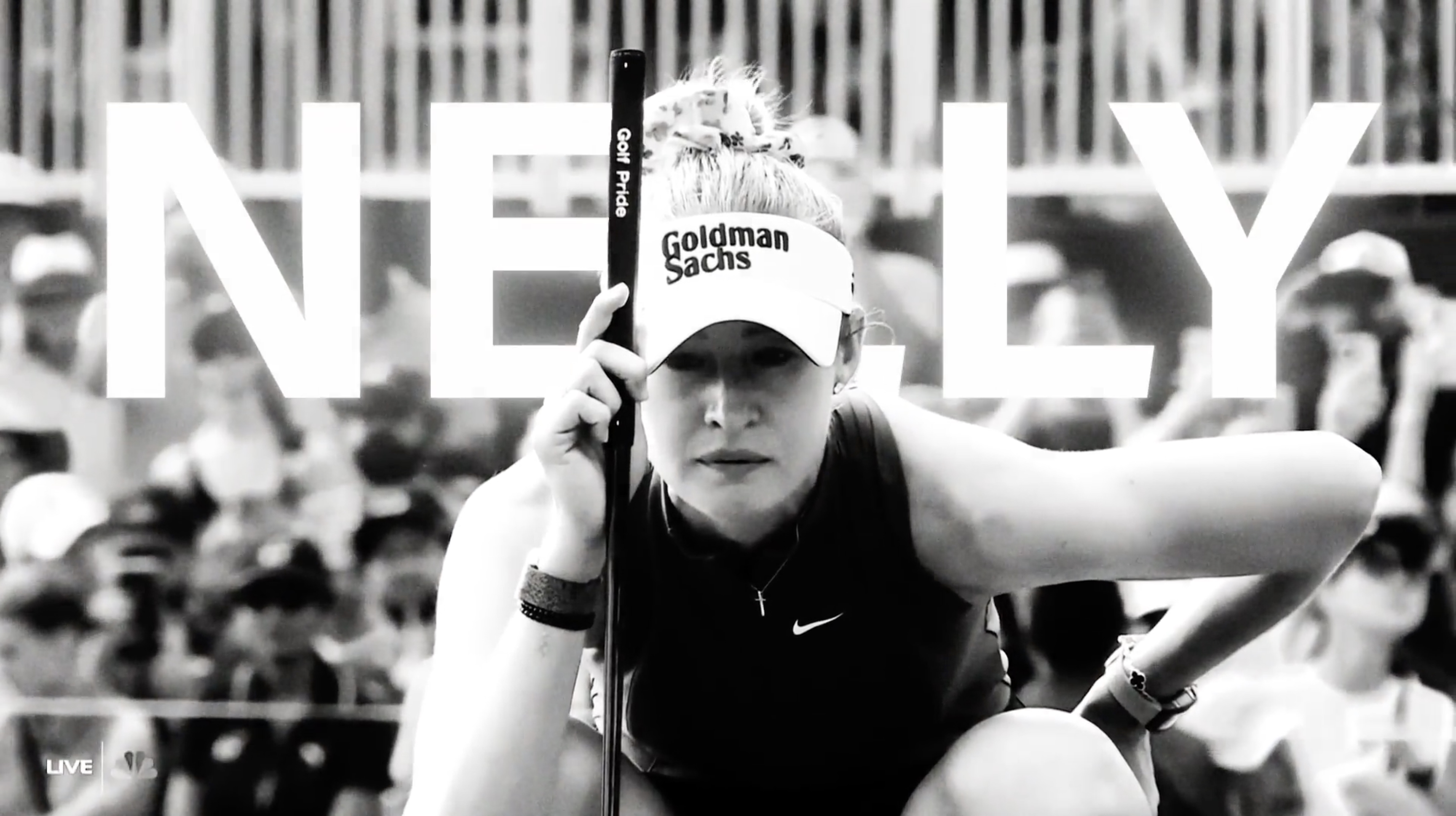 Nelly Korda reading a putt at the Chevron Championship, black and white