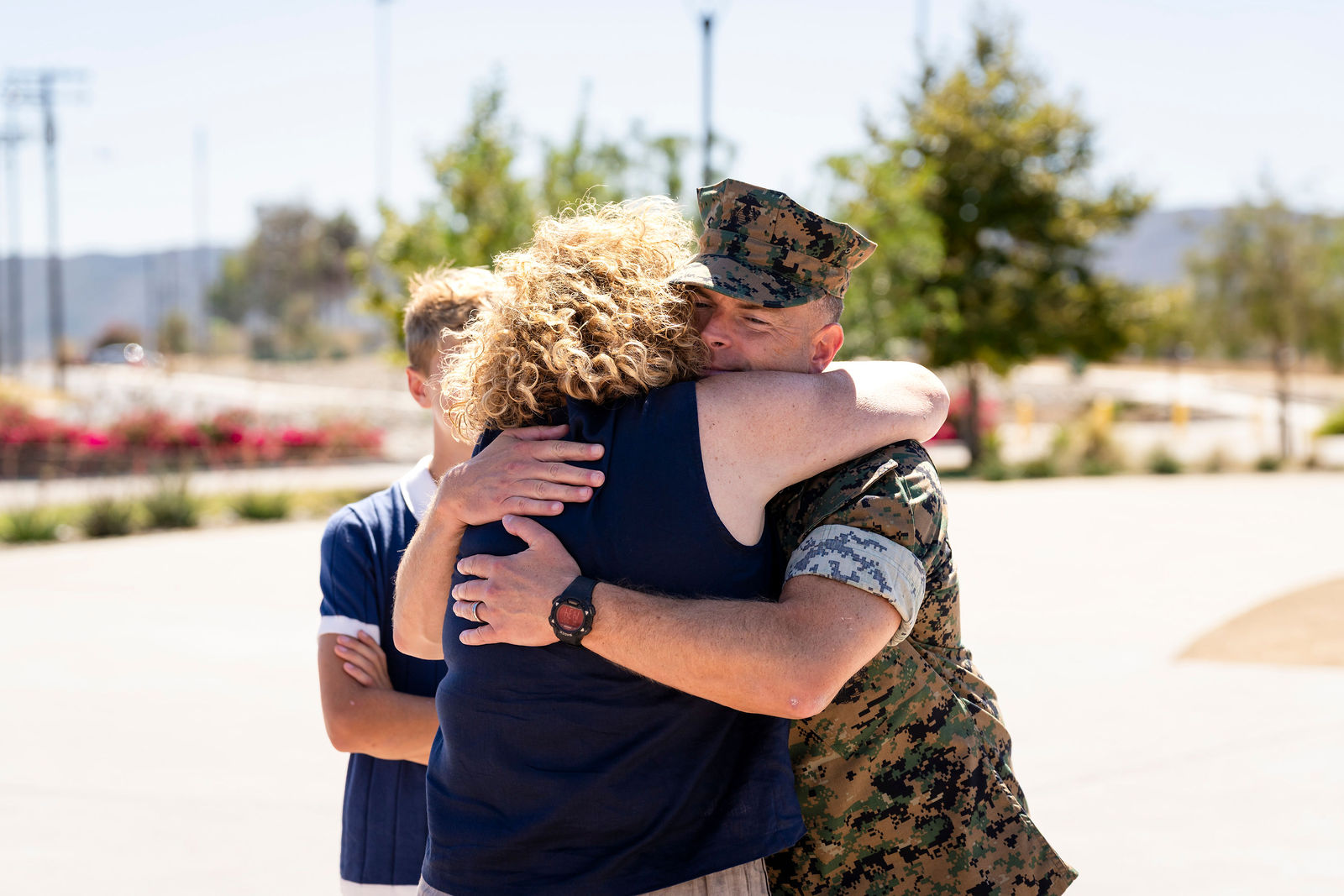 An embrace after Colonel Eric Skoczenski's promotion ceremony