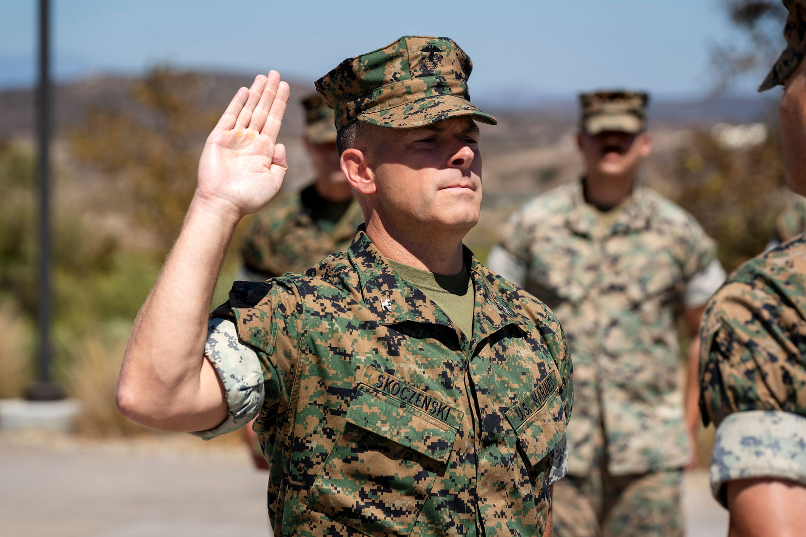 Colonel Eric Skoczenski taking the oath
