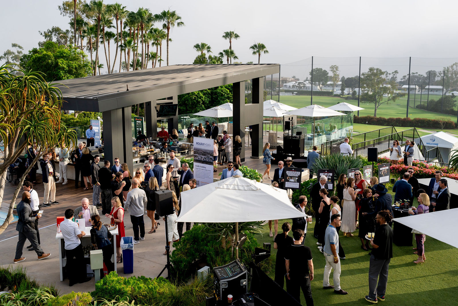 The outdoor venue in Newport Beach filled with guests, seen from above