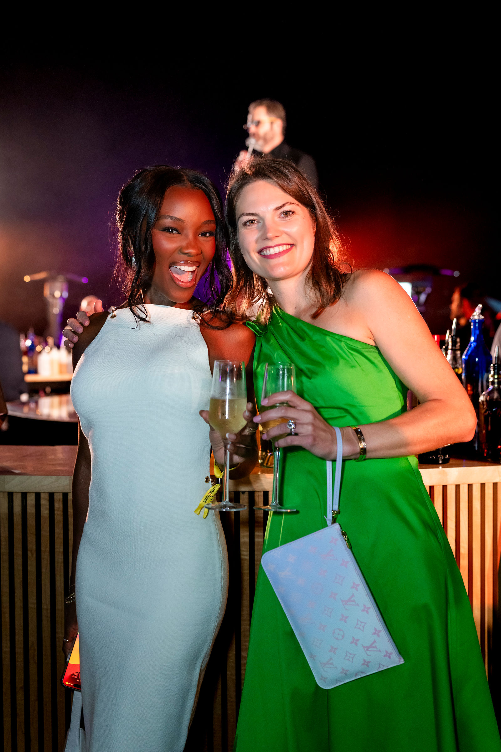Two guests enjoying the nighttime celebration