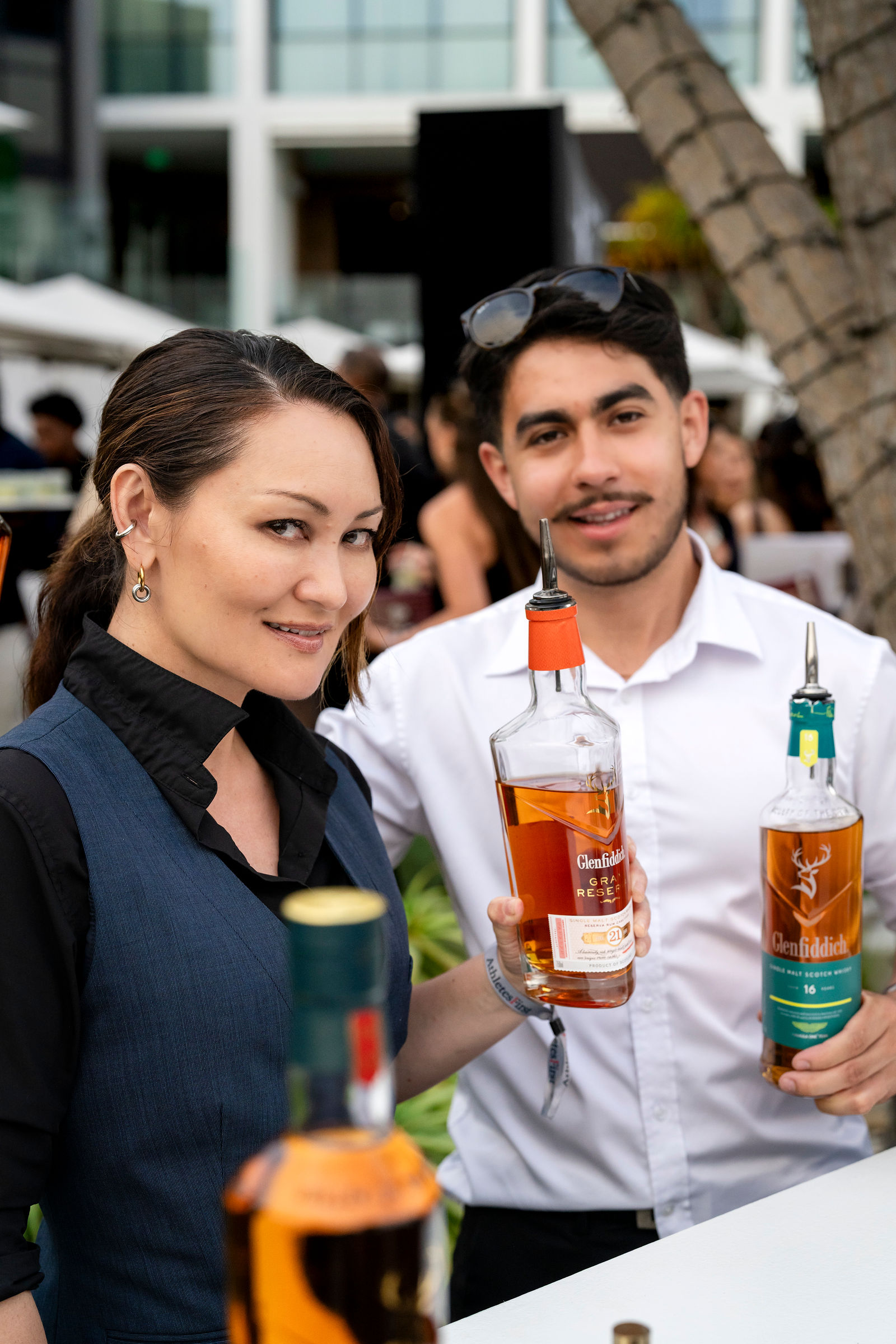 Bar staff presenting the evening's spirits