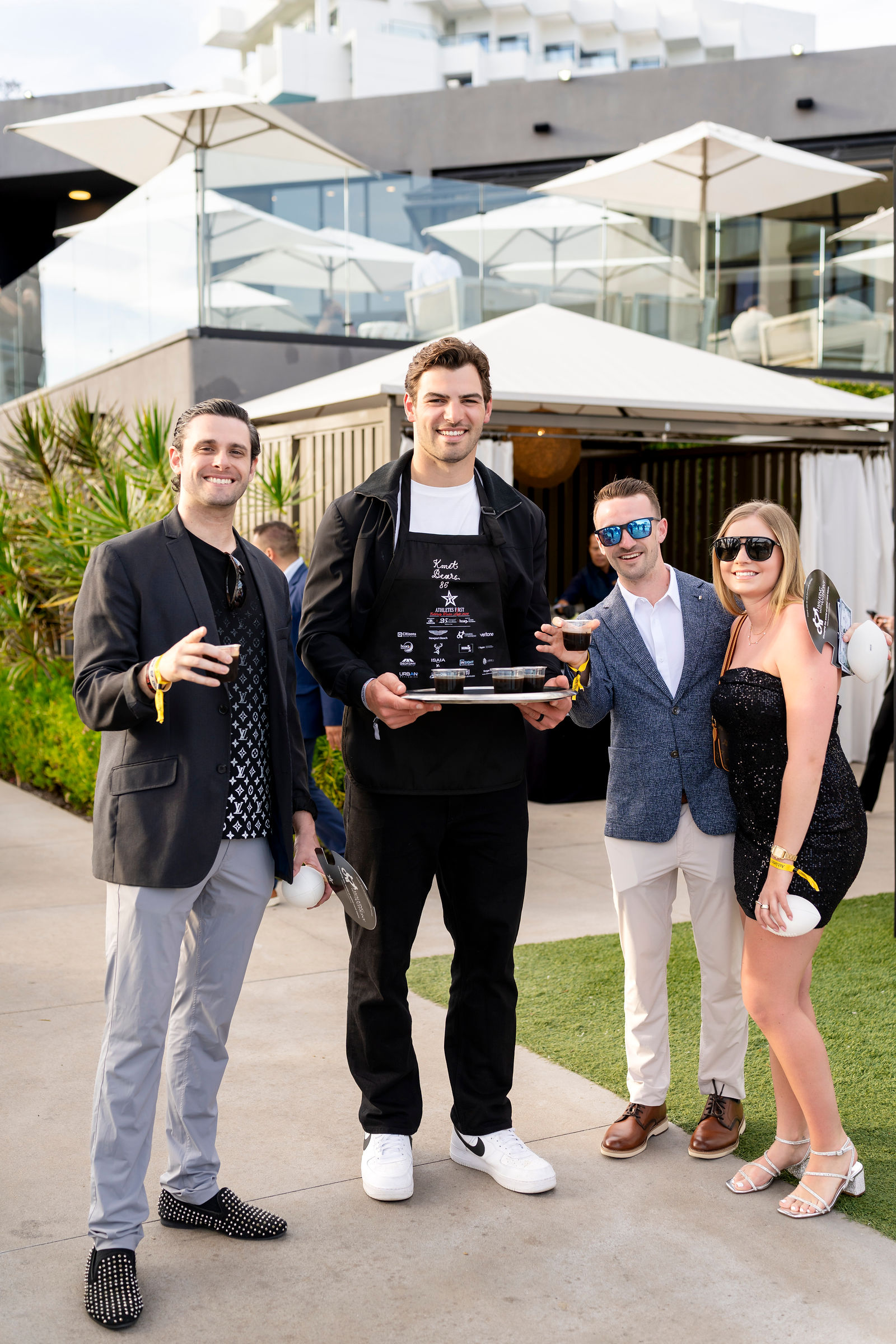 An athlete with guests during the reception