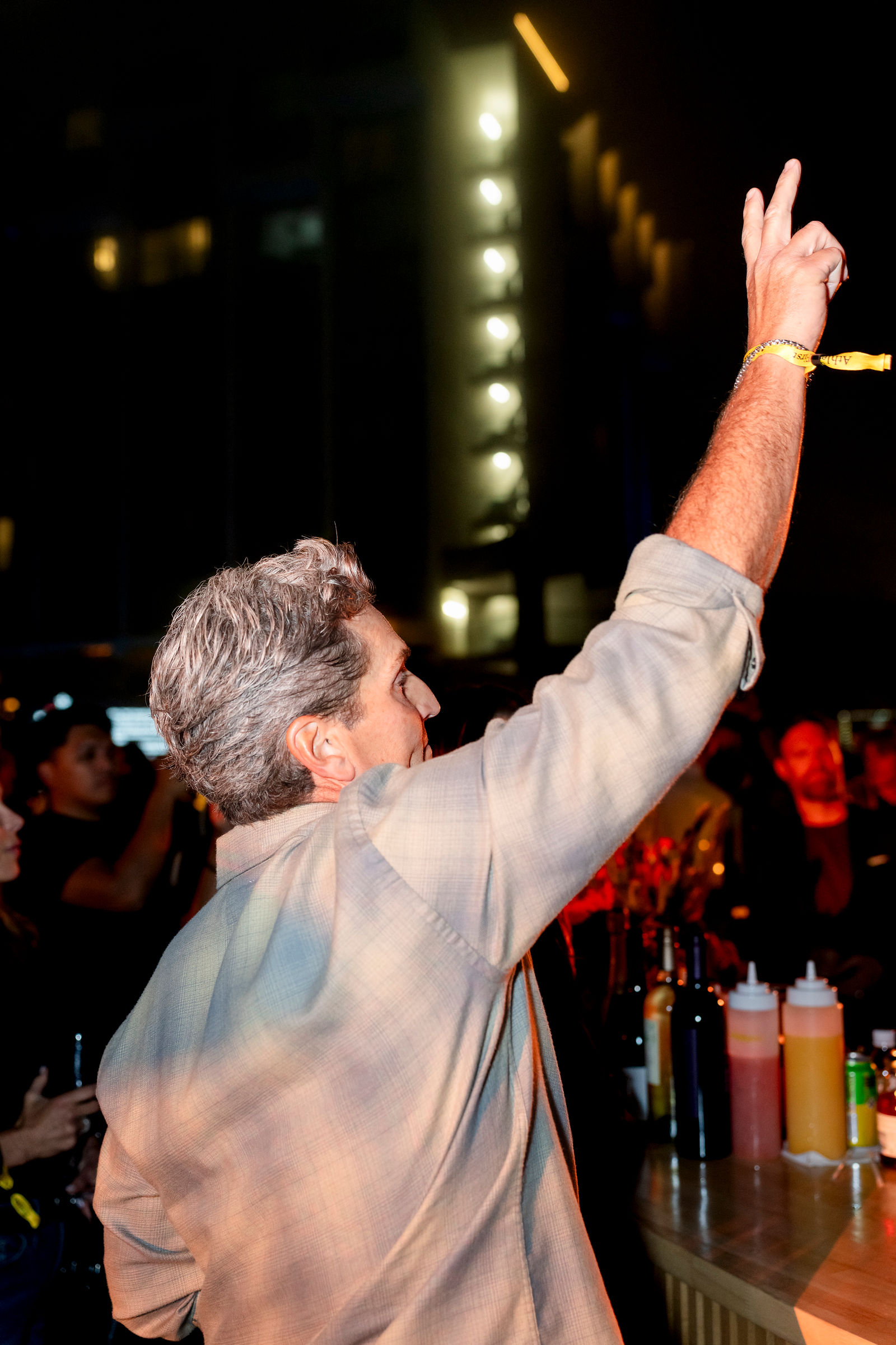 A guest bidding during the live auction