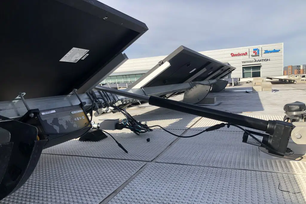 Close-up of Rocking Solar rooftop solar tracking installation