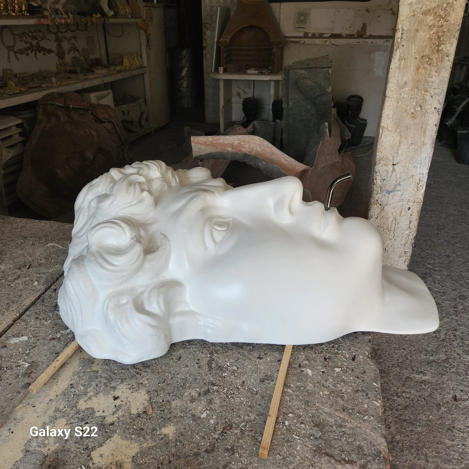 Basin Head — the white cast with the pipe in the mouth, Zeynep Didem Bardakcı Studio