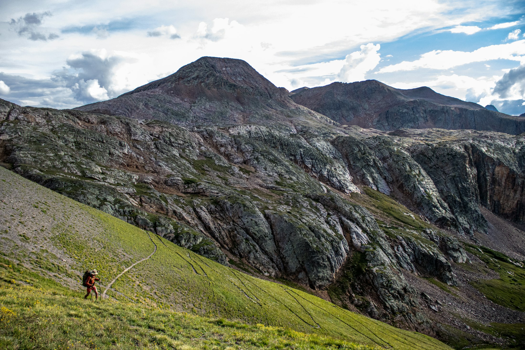 Alpine ridge and distant hikers