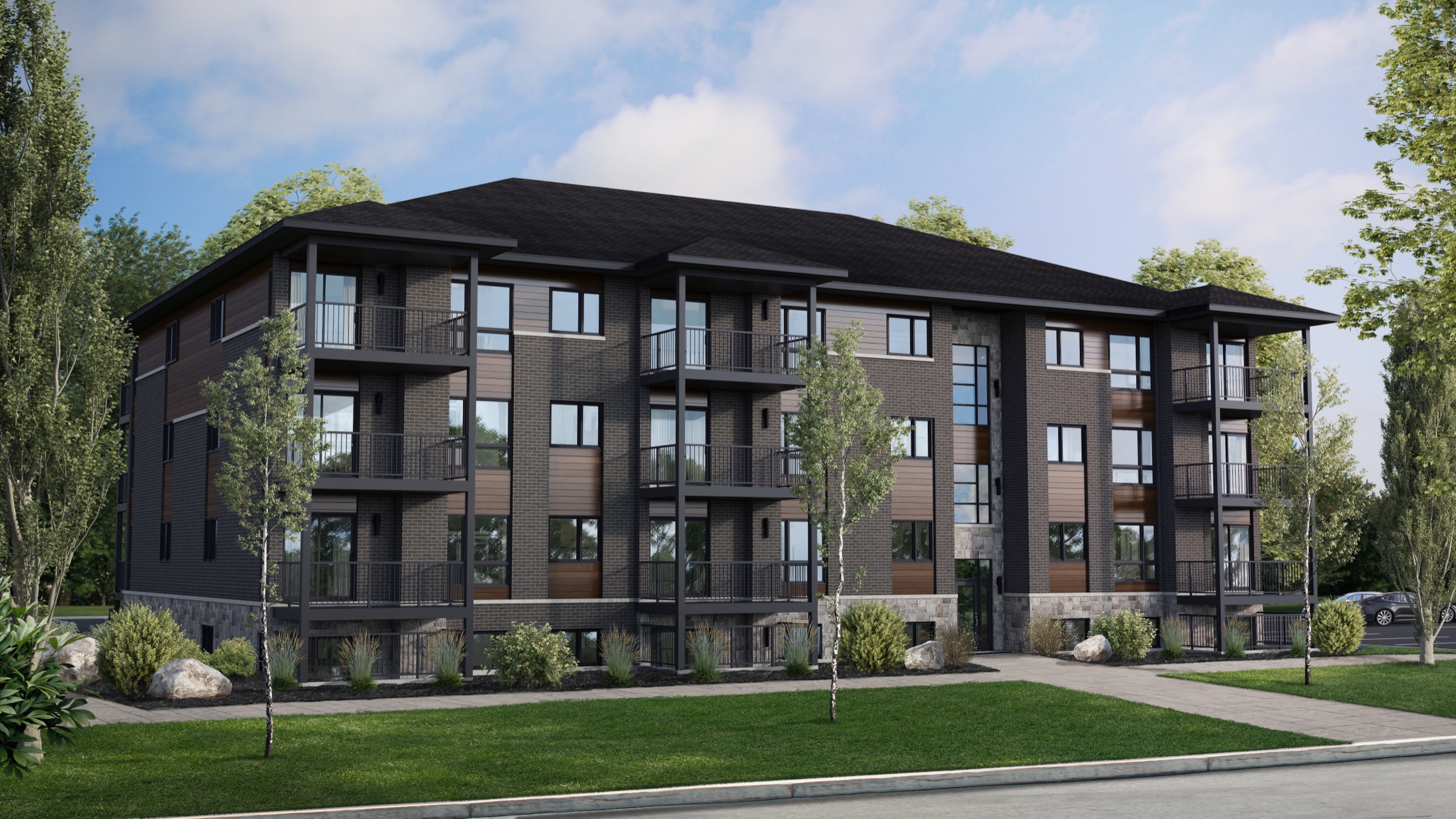 Immeuble de condos locatifs de 4 étages avec balcons, rue Magloire-Lavallée à Mirabel