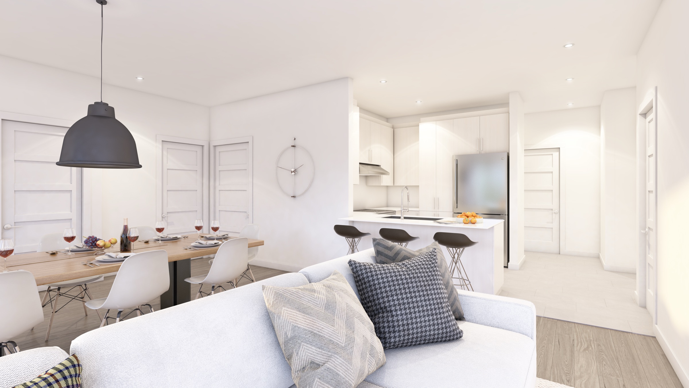 Aire ouverte d'un condo du Complexe Champagne avec cuisine et salon