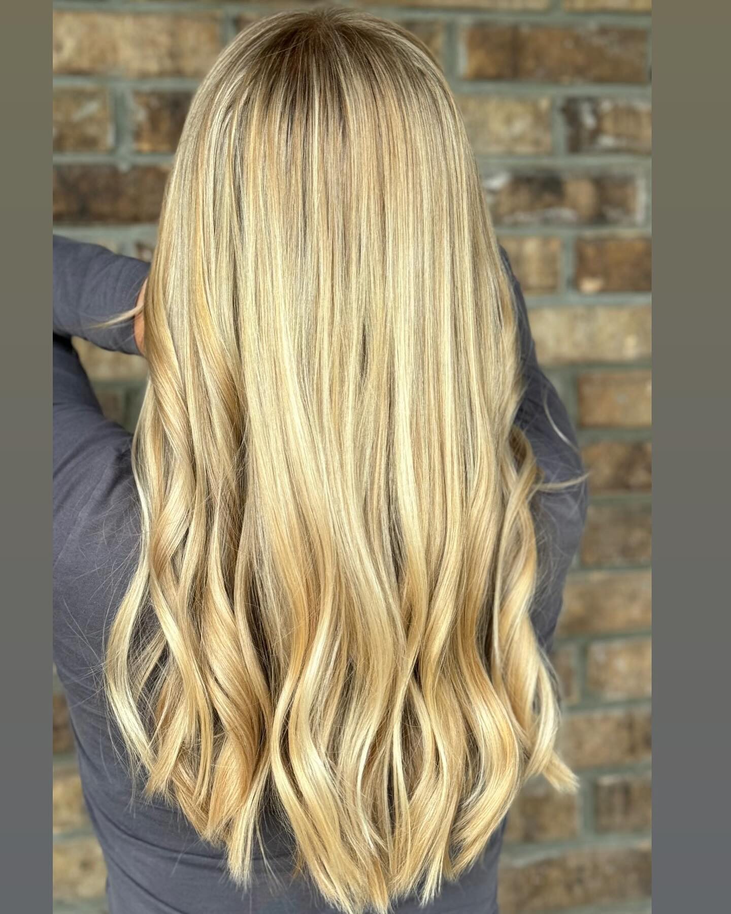 Bright blonde foil highlights with waves