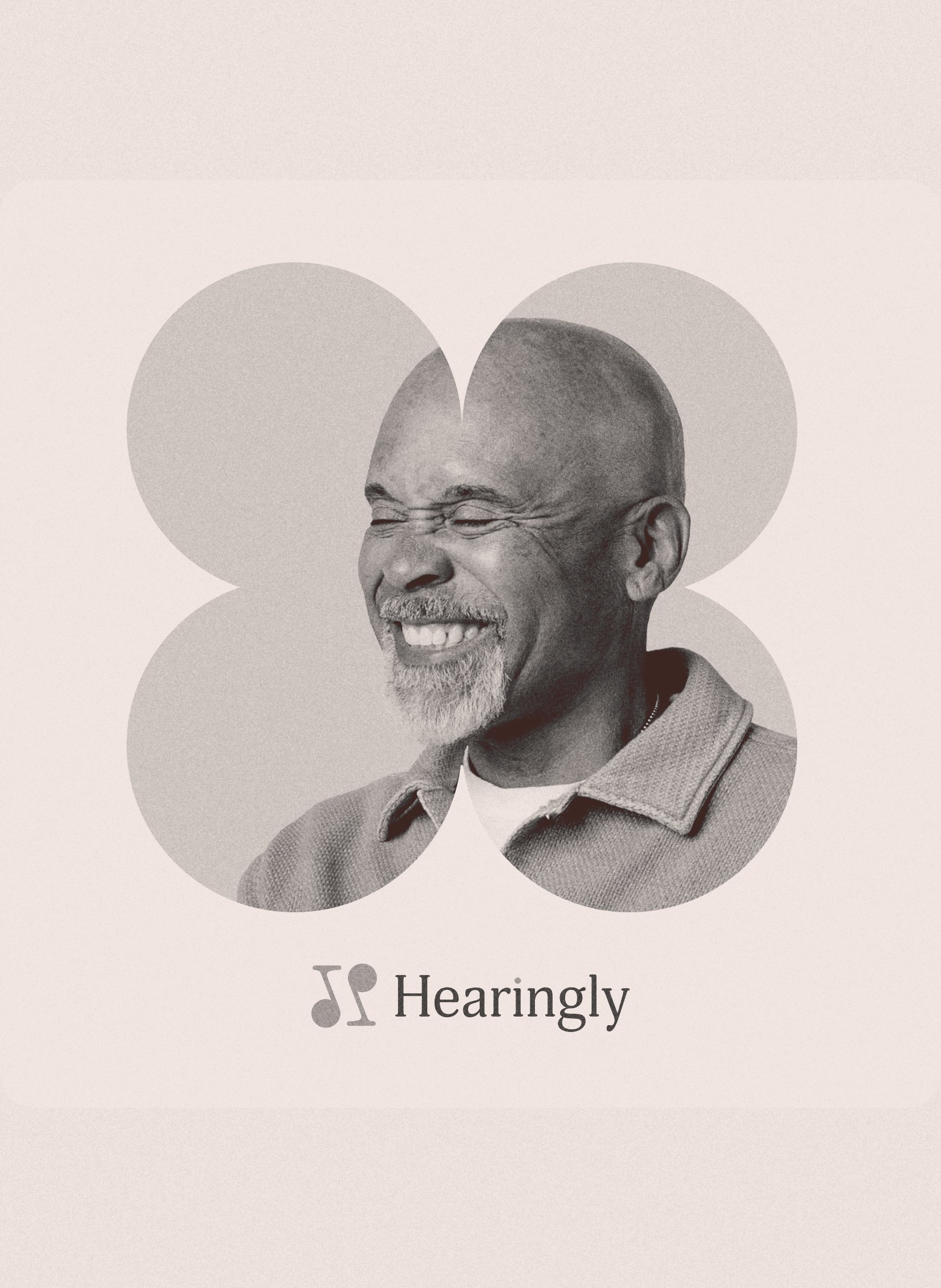 A smiling man framed by the Hearingly clover, with the Hearingly logo