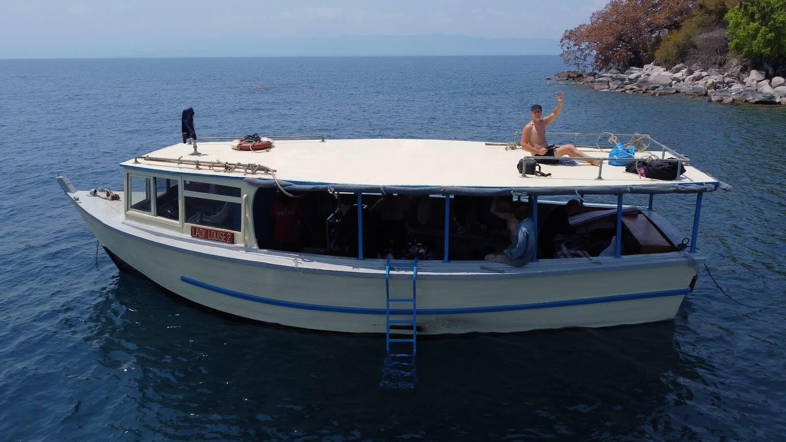 The Lady Louise moored by an island on Lake Malawi