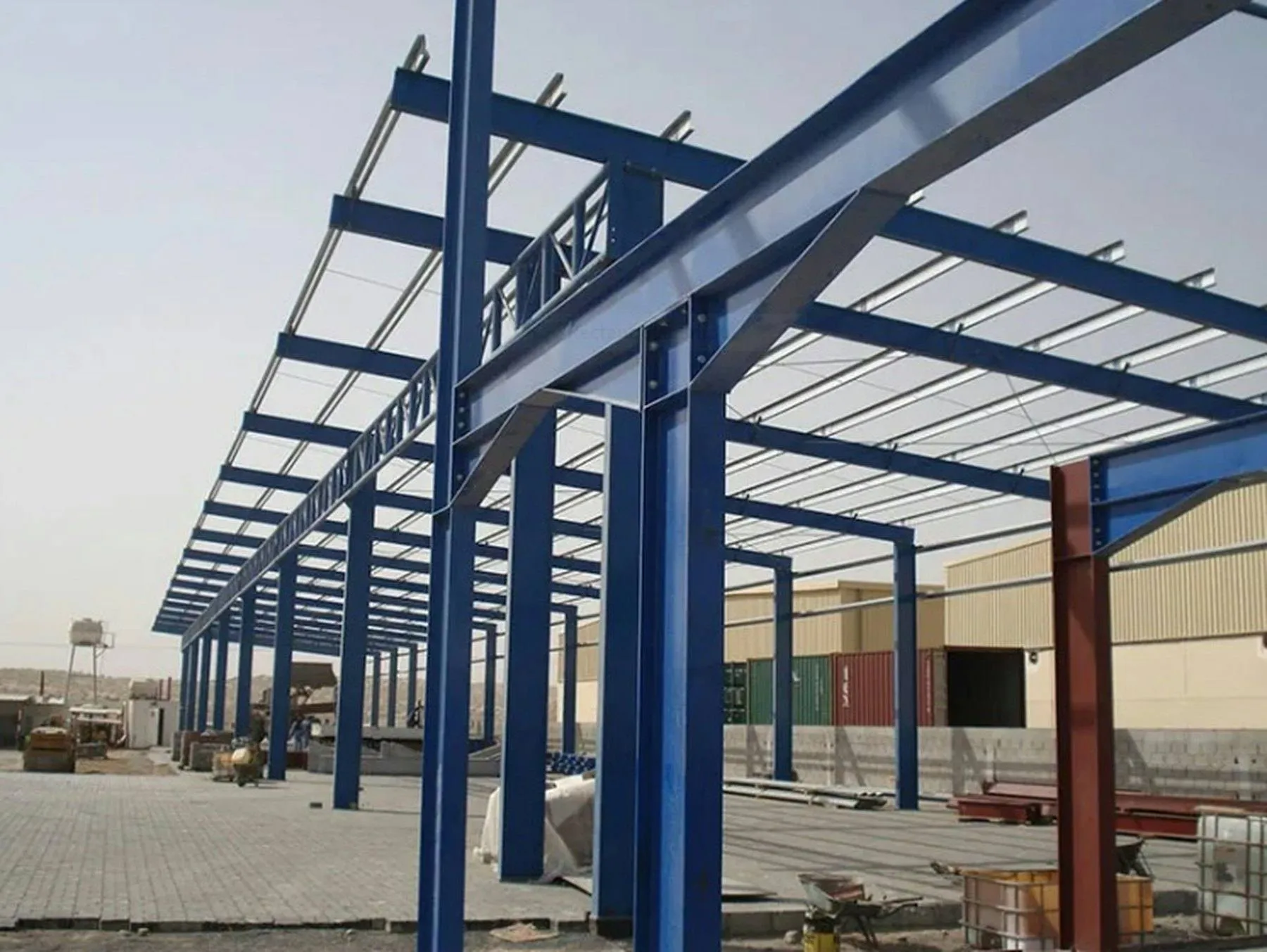 Blue structural steel framing for a commercial building