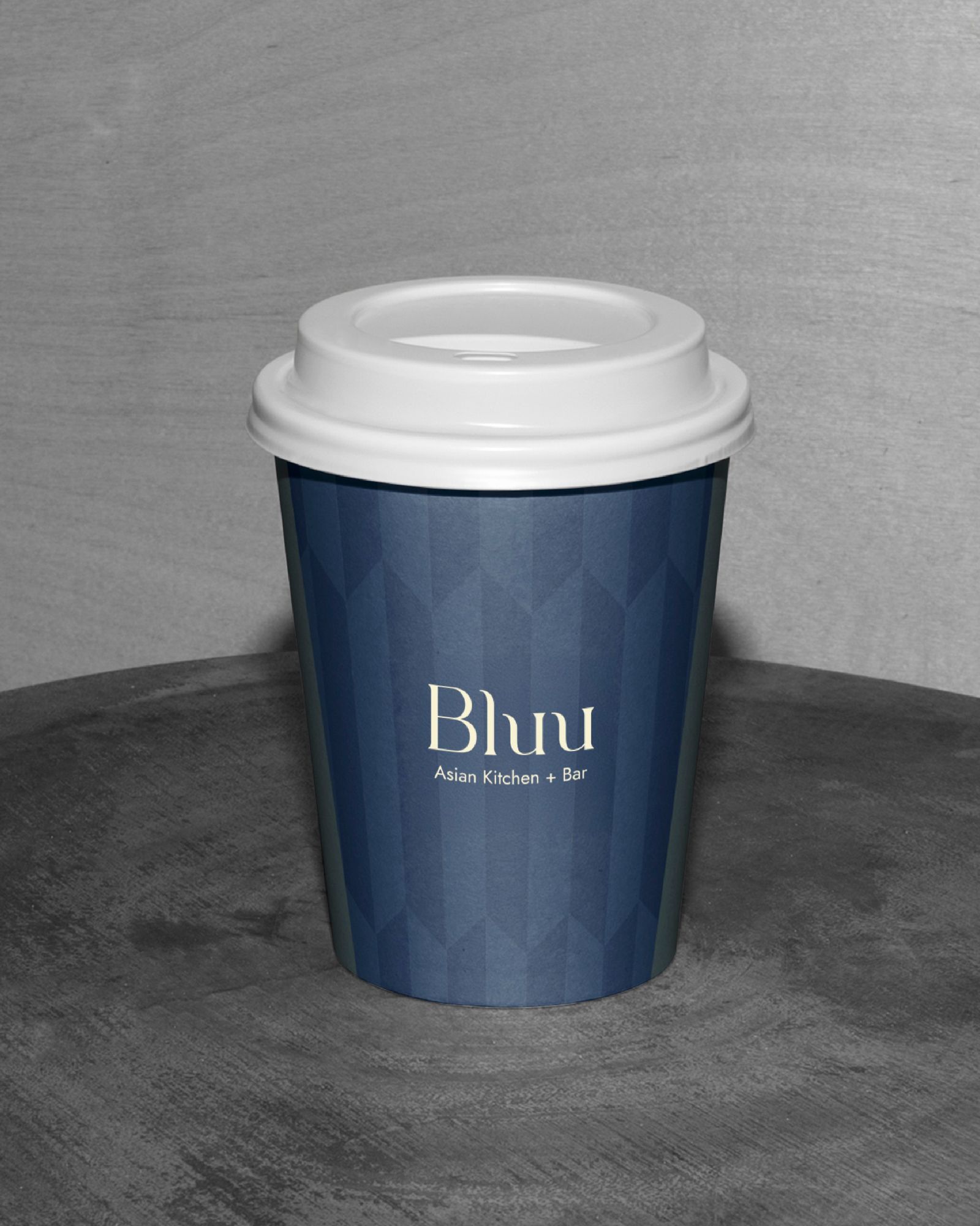 Bluu branded coffee cup by STRE