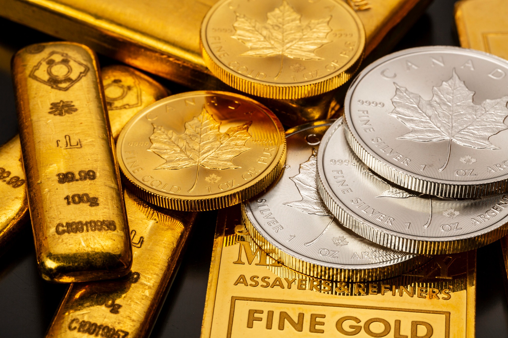 Gold bars and Canadian gold and silver coins