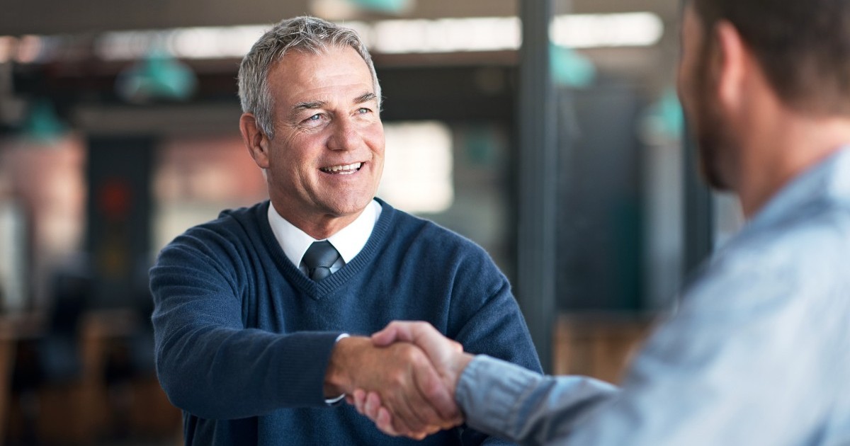 Executive shaking hands after an interview