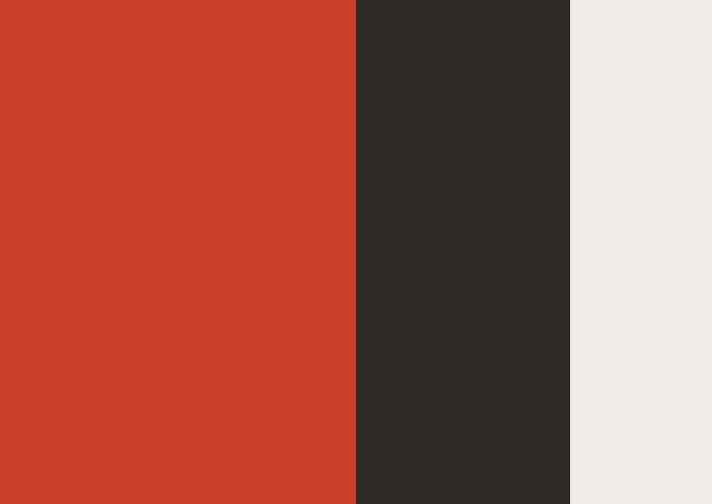 The palette: one bold carnelian, grounded by charcoal and warm paper