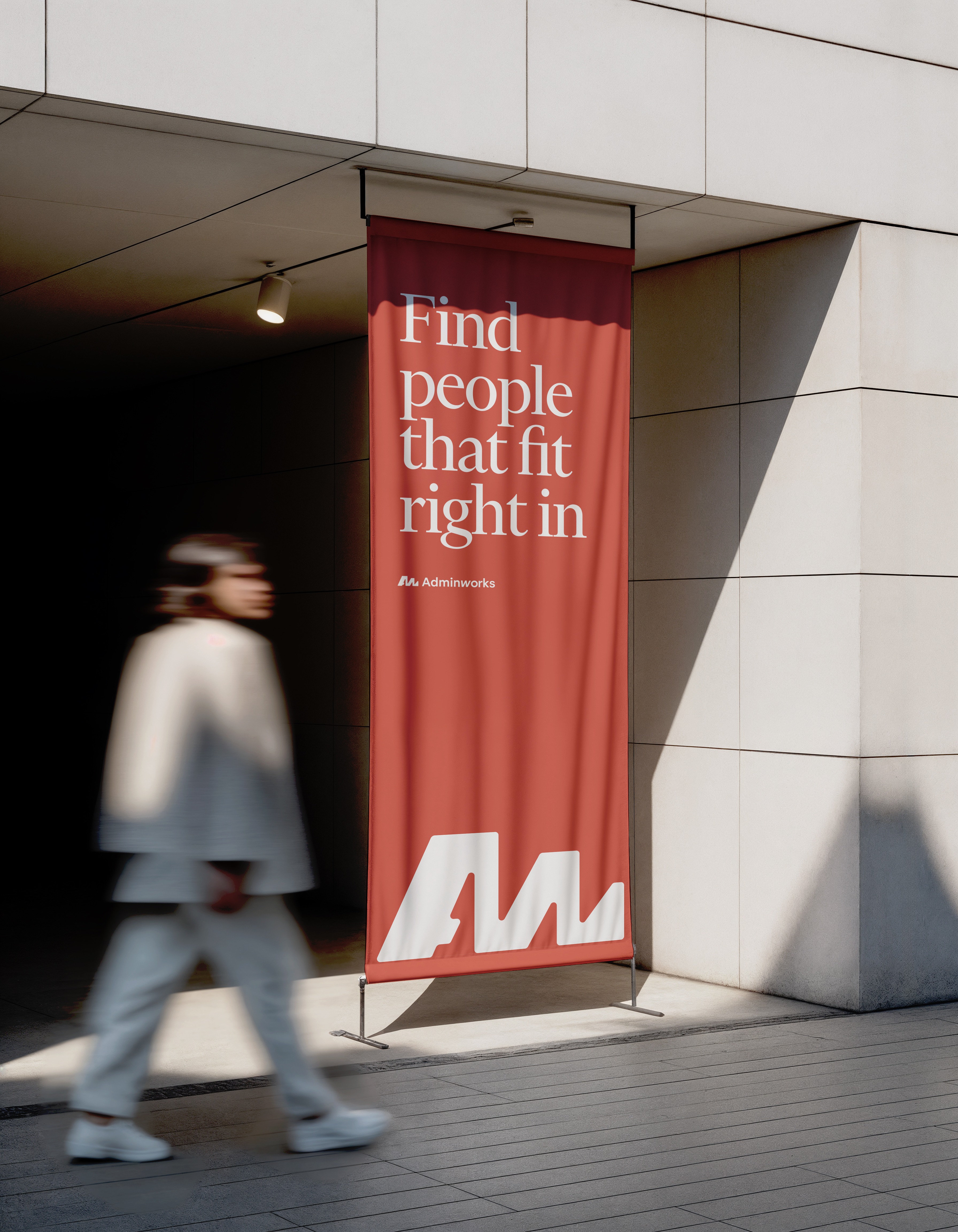 The line on a street banner, carnelian against pale stone