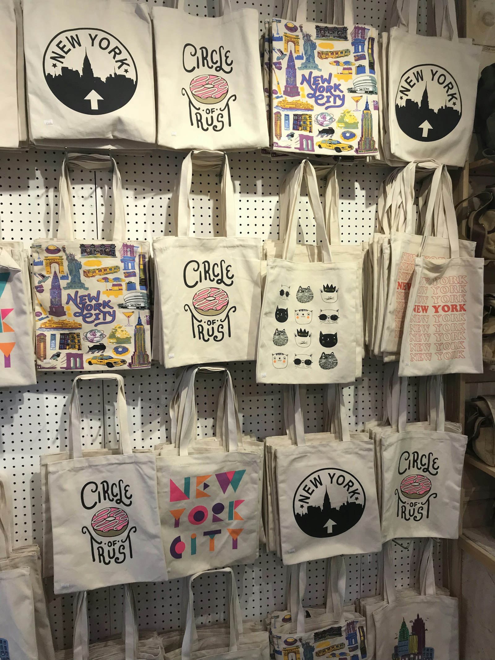 Row of printed tote bags