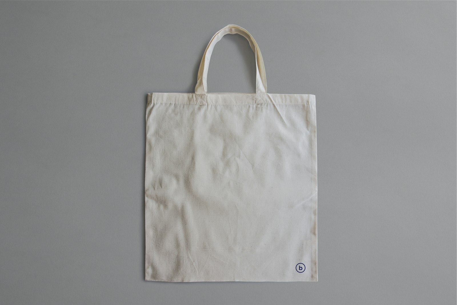 White branded tote bag