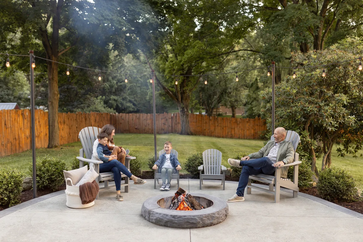 Family relaxing in Berlin Gardens Adirondack chairs