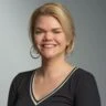 A headshot of Kate Carlson.