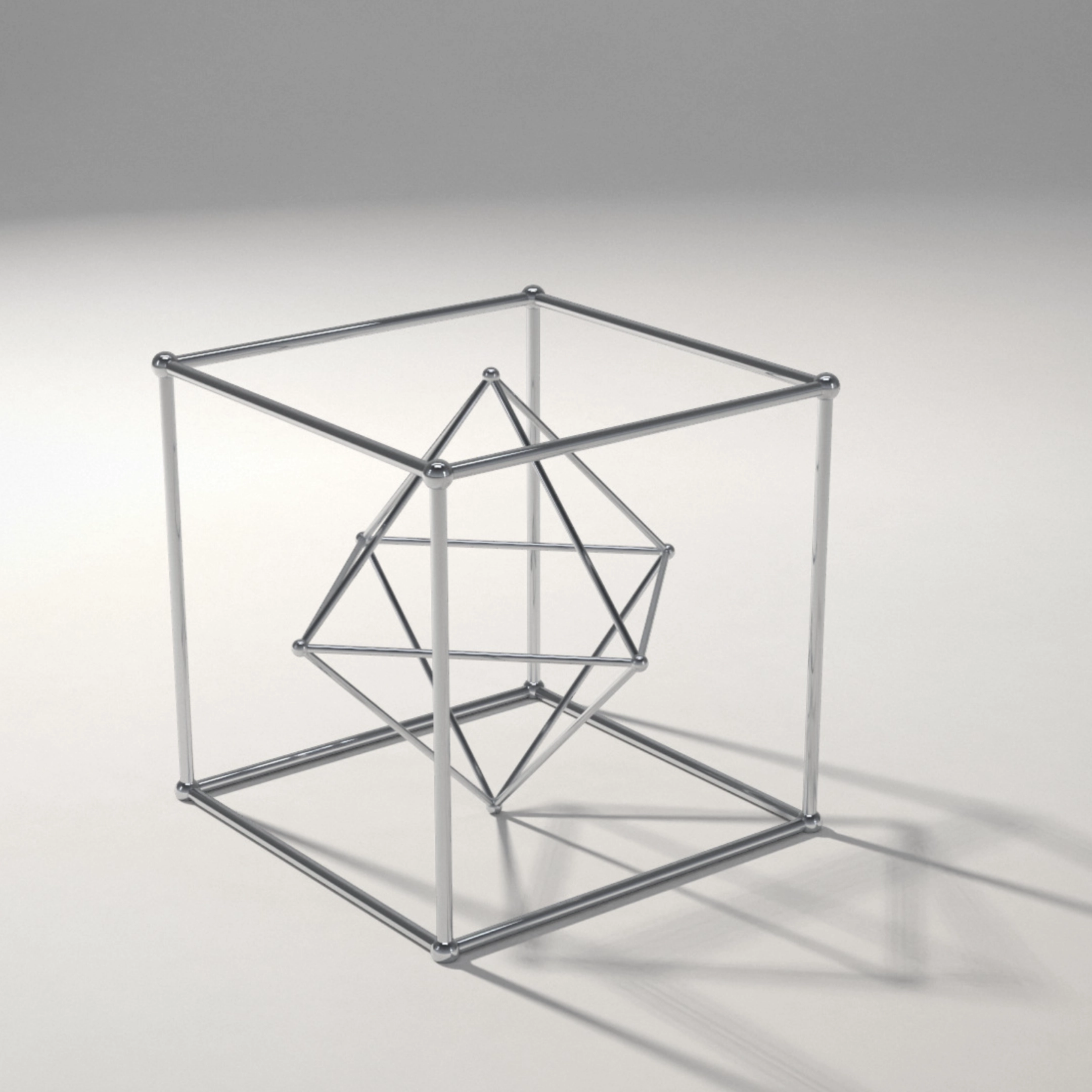 A three-dimensional metal wireframe sculpture consisting of a smaller octahedron suspended inside a larger cube, casting a shadow on a light surface.